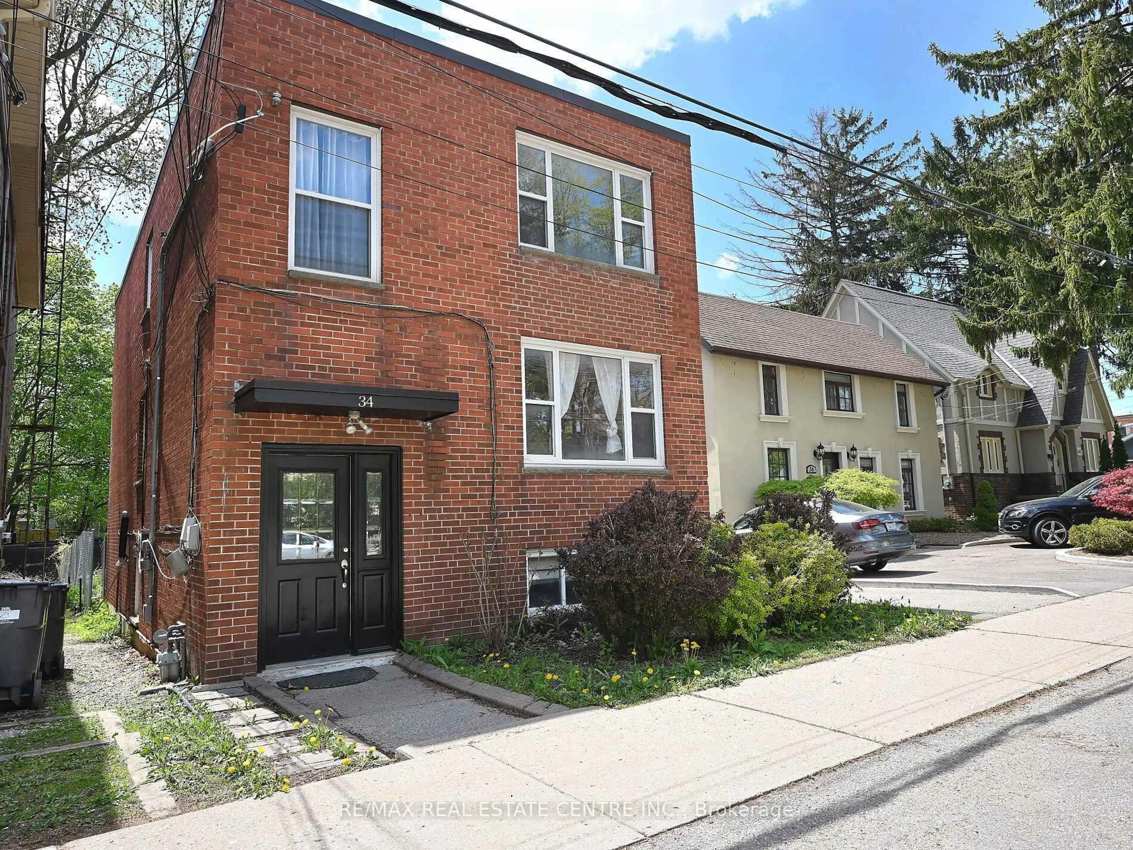 Home with brick exterior material, street for 34 Mississauga Rd, Mississauga Ontario L5H 2H6