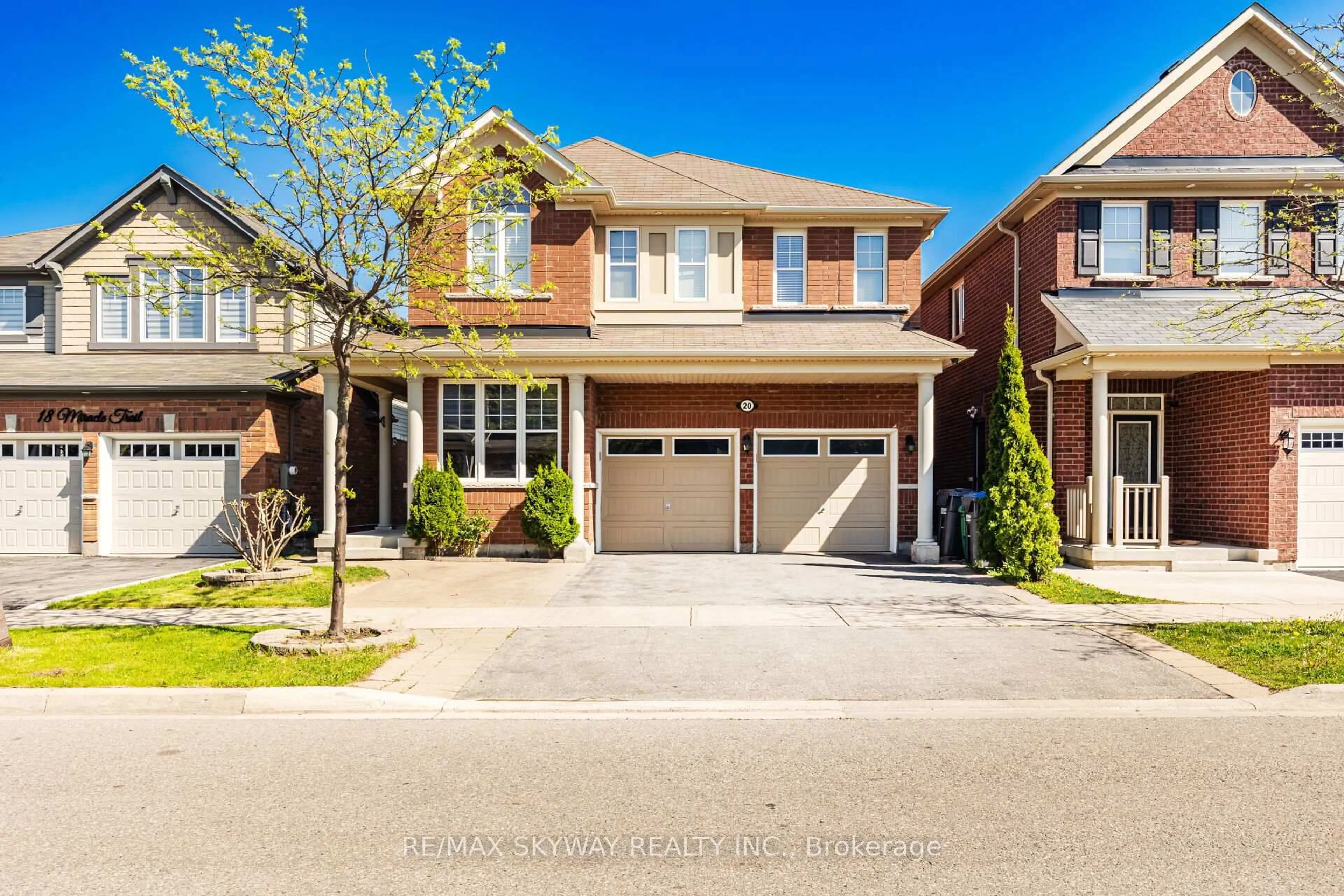 Home with brick exterior material, street for 20 Miracle Tr, Brampton Ontario L7A 0Y3