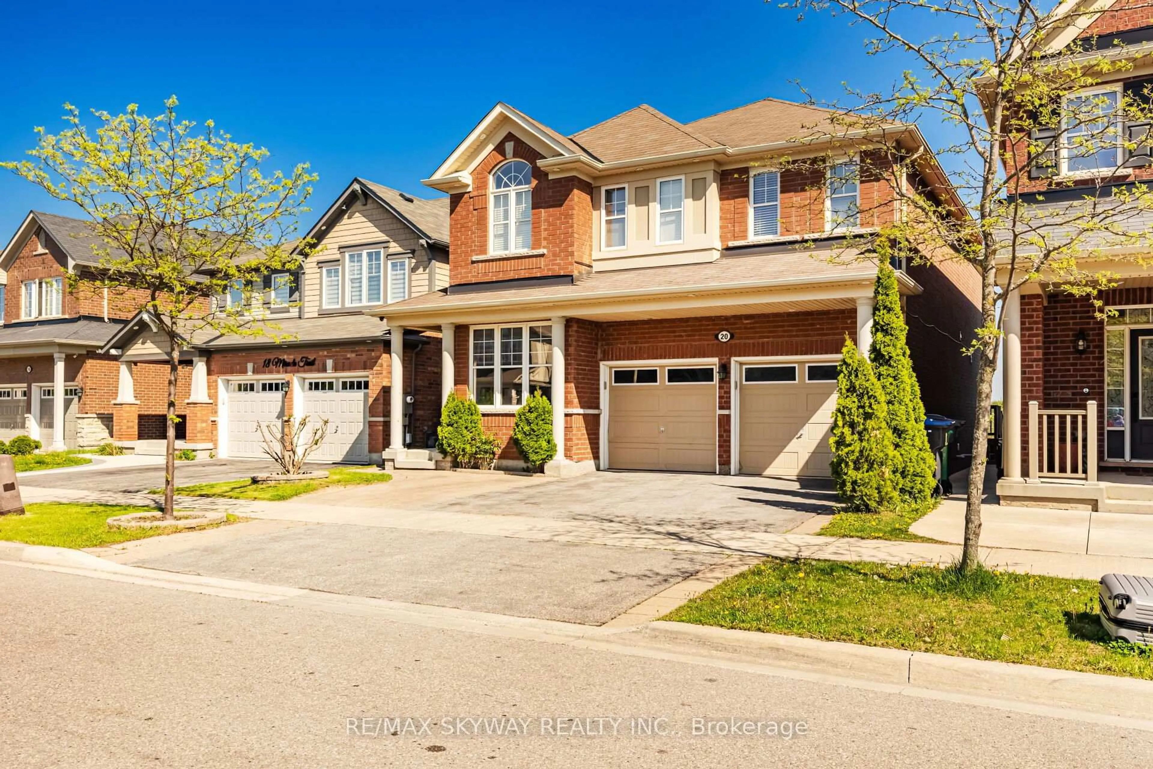 Home with brick exterior material, street for 20 Miracle Tr, Brampton Ontario L7A 0Y3