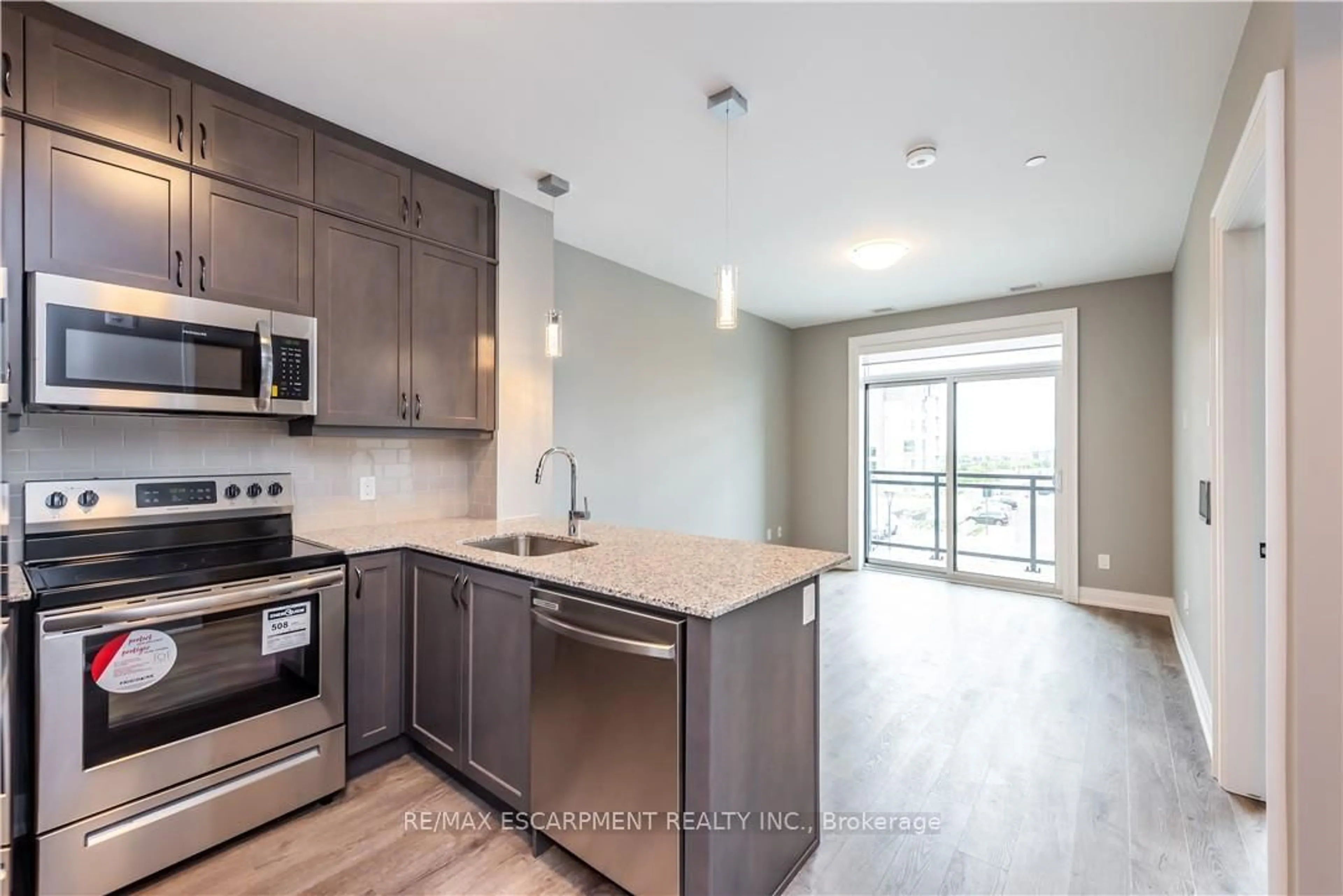 Open concept kitchen, unknown for 50 KAITTING Tr #303, Oakville Ontario L6M 5N3