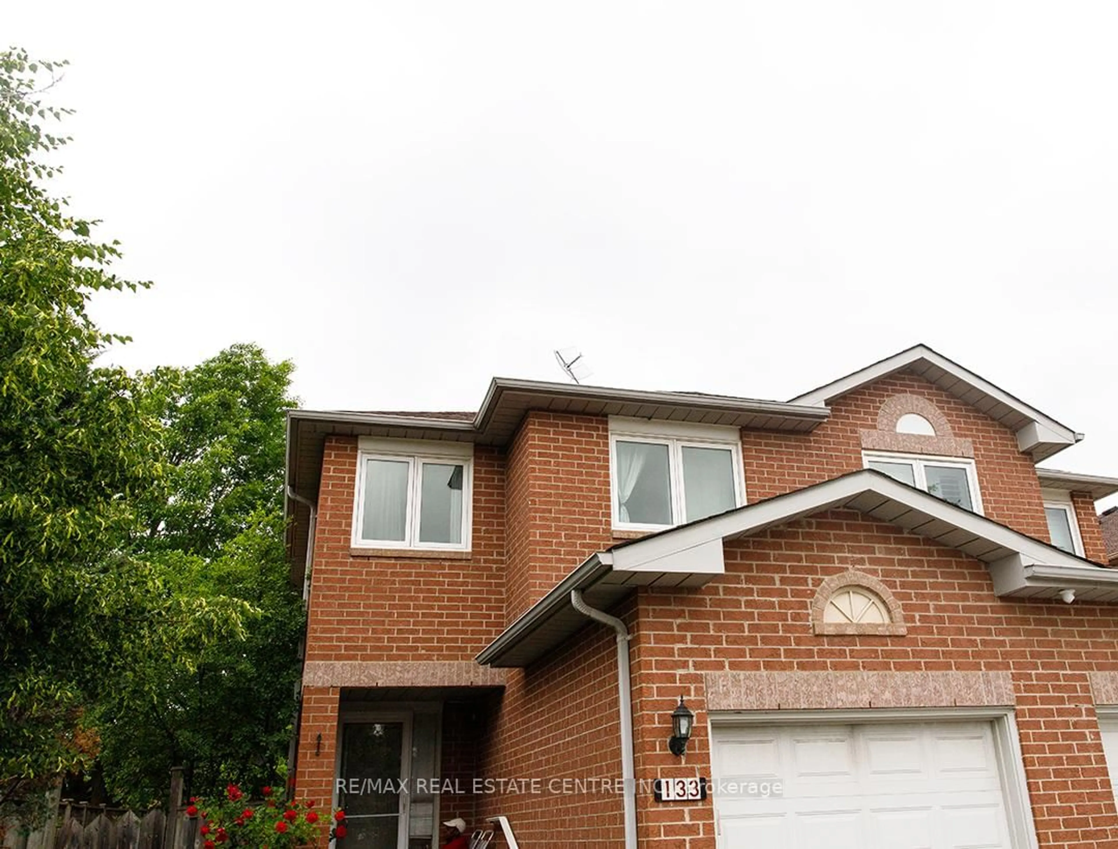 Home with brick exterior material, street for 133 Saddletree Tr, Brampton Ontario L6X 4M9
