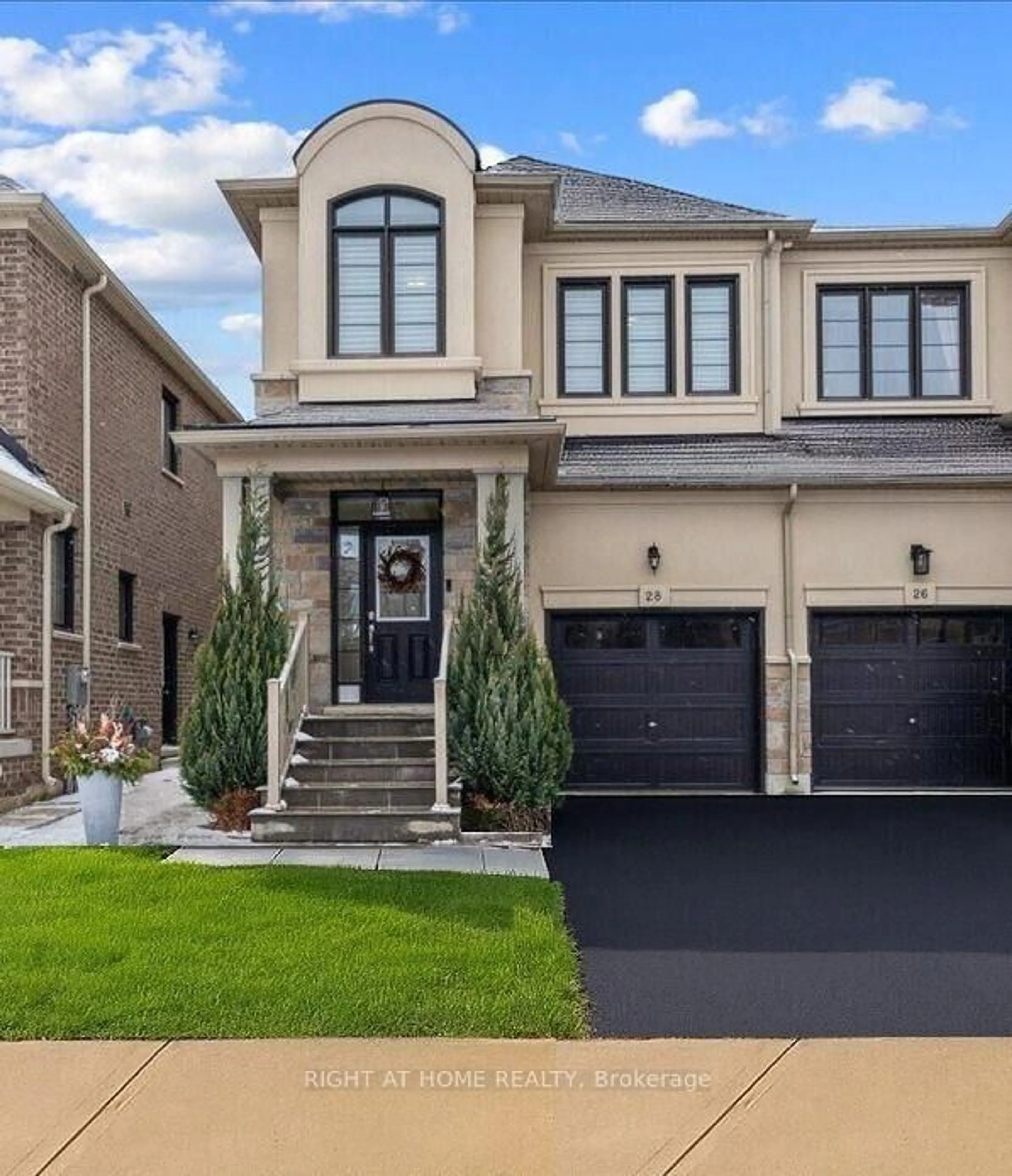 Home with brick exterior material, street for 28 Hubbell Rd, Brampton Ontario L6Y 2A5