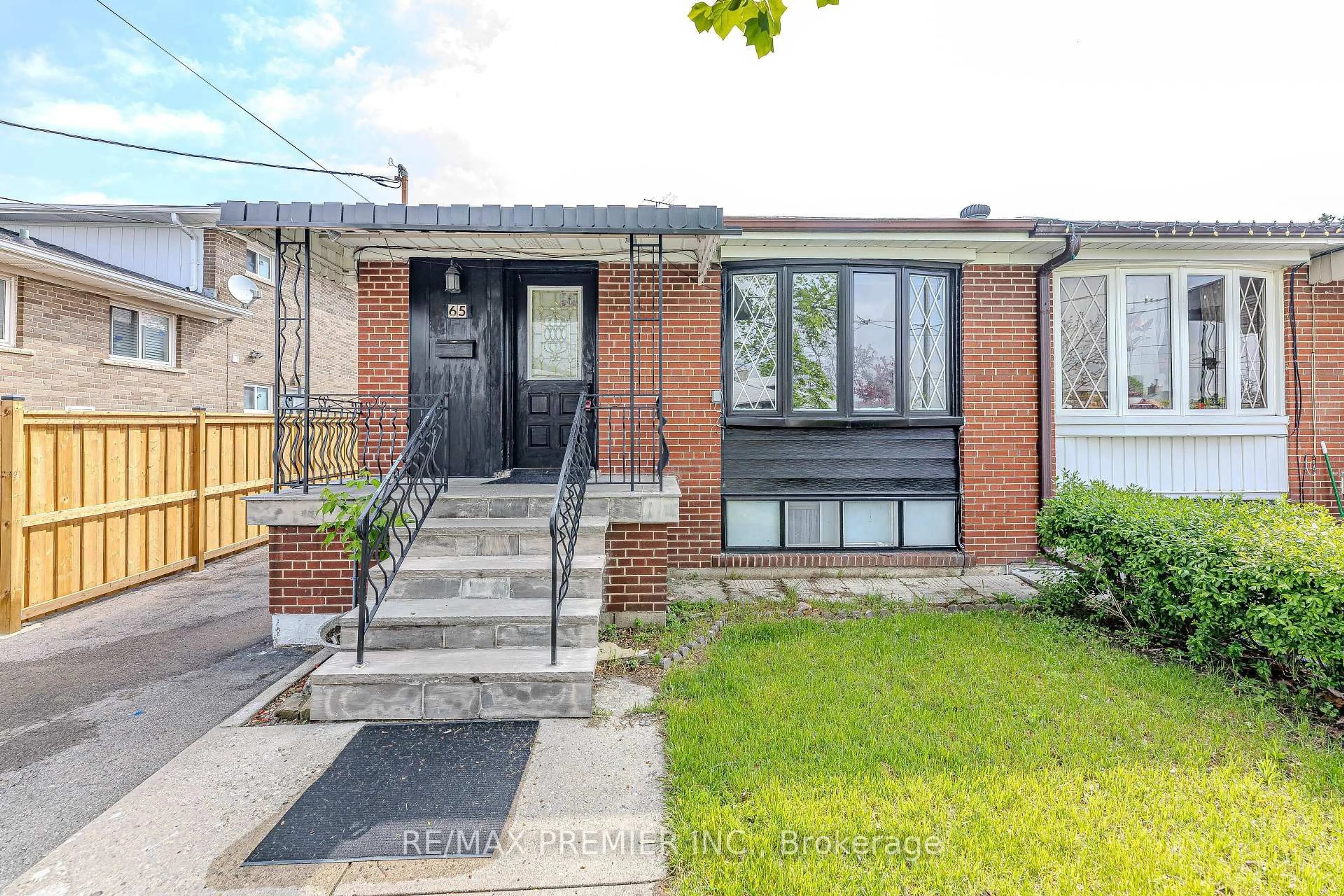 Home with brick exterior material, street for 65 Elnathan Cres, Toronto Ontario M9L 2G2