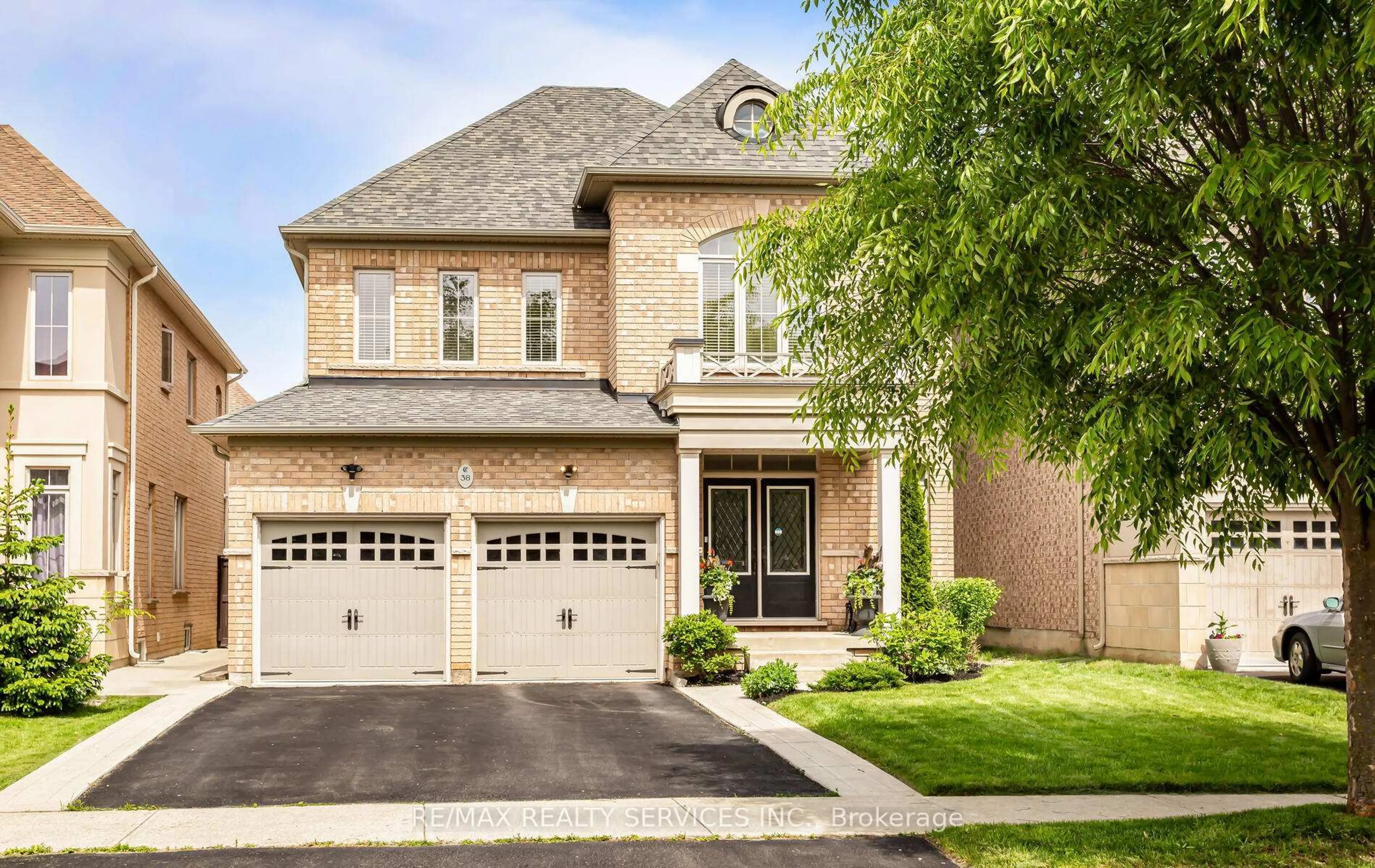 Home with brick exterior material, street for 38 Impulse Circ, Brampton Ontario L6X 0E3