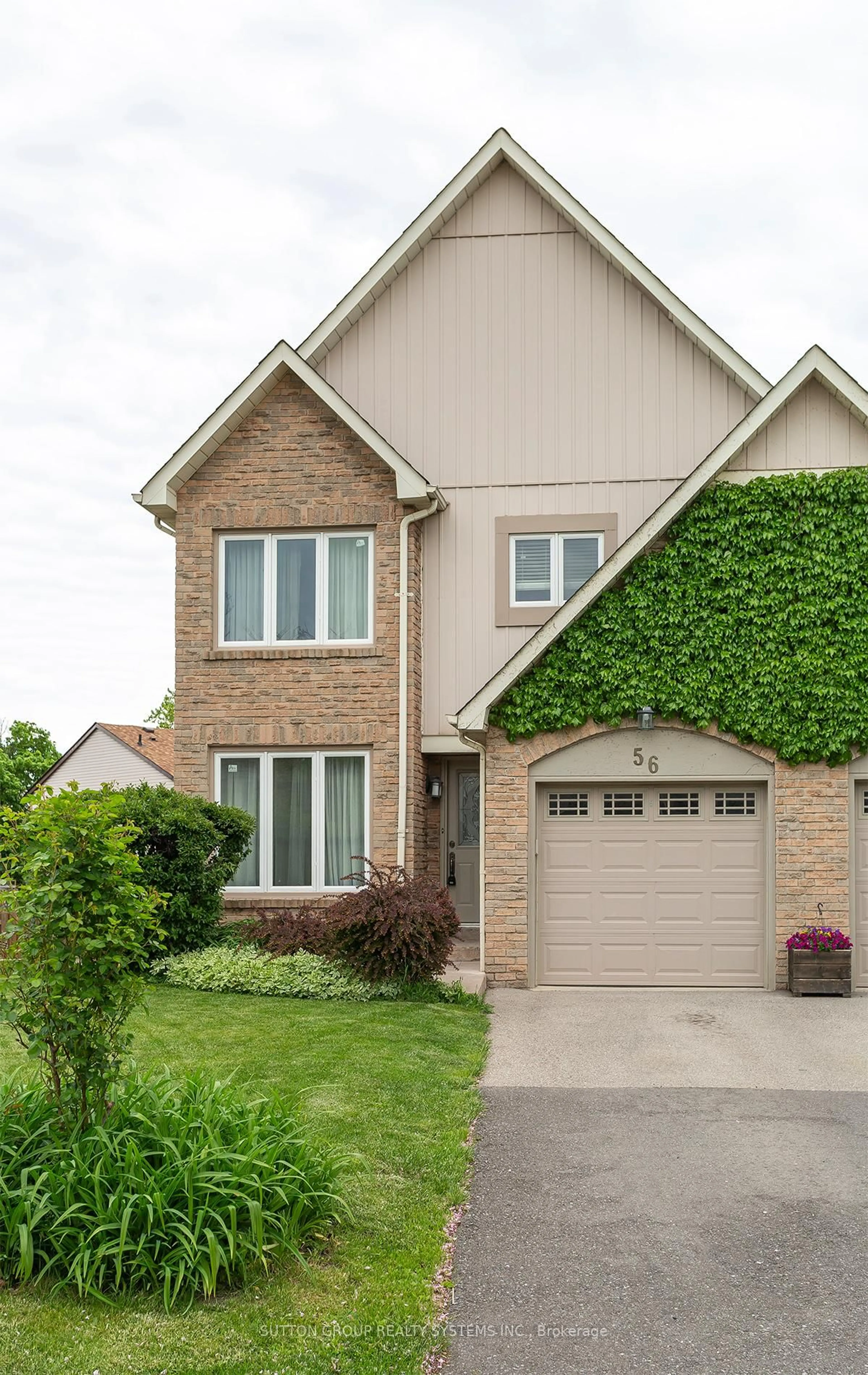 Home with brick exterior material, street for 56 Millsborough Cres, Toronto Ontario M9C 5E8