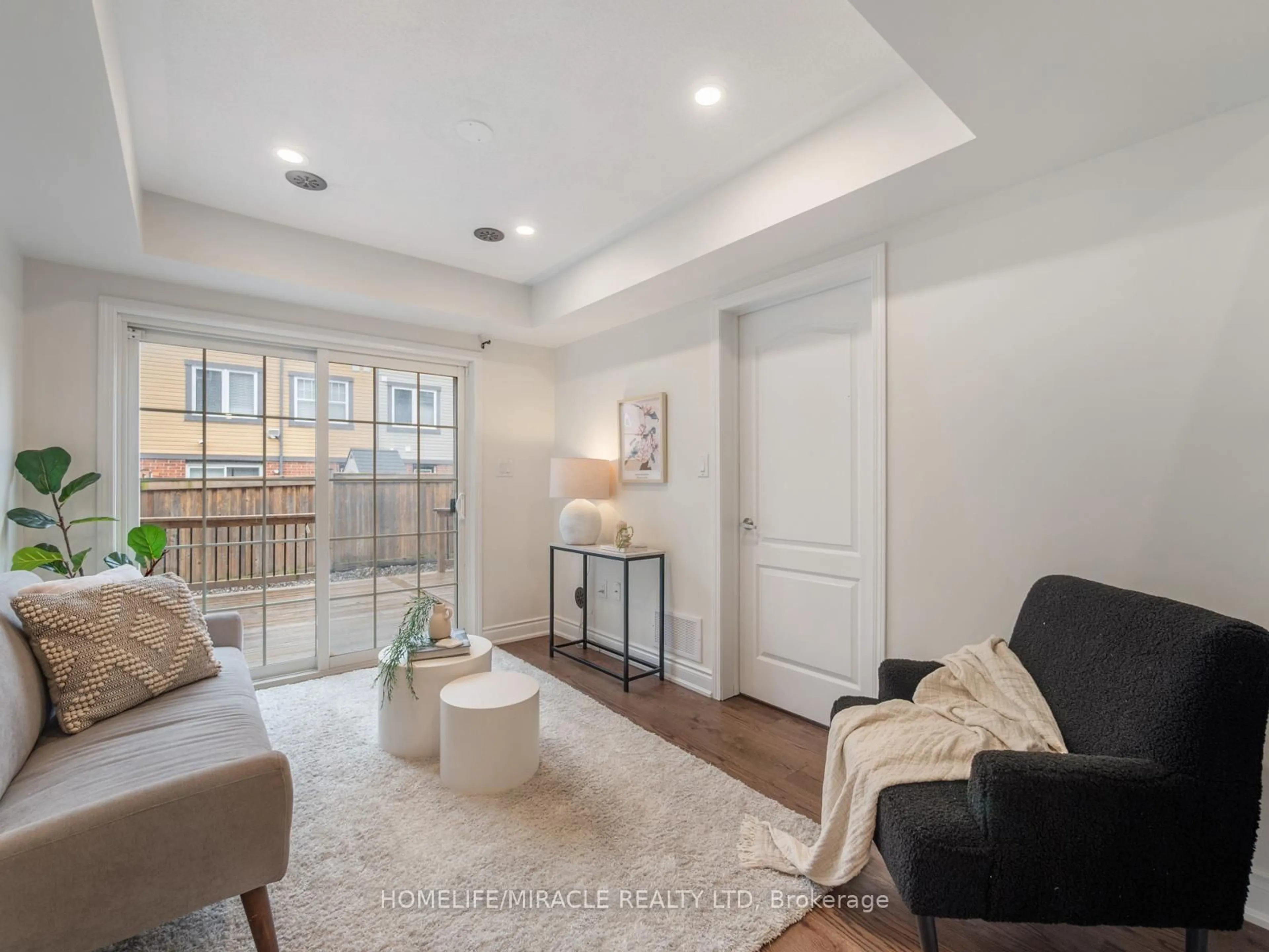 Living room with furniture, ceramic/tile floor for 7 Viewforth Rd, Brampton Ontario L7A 0R2