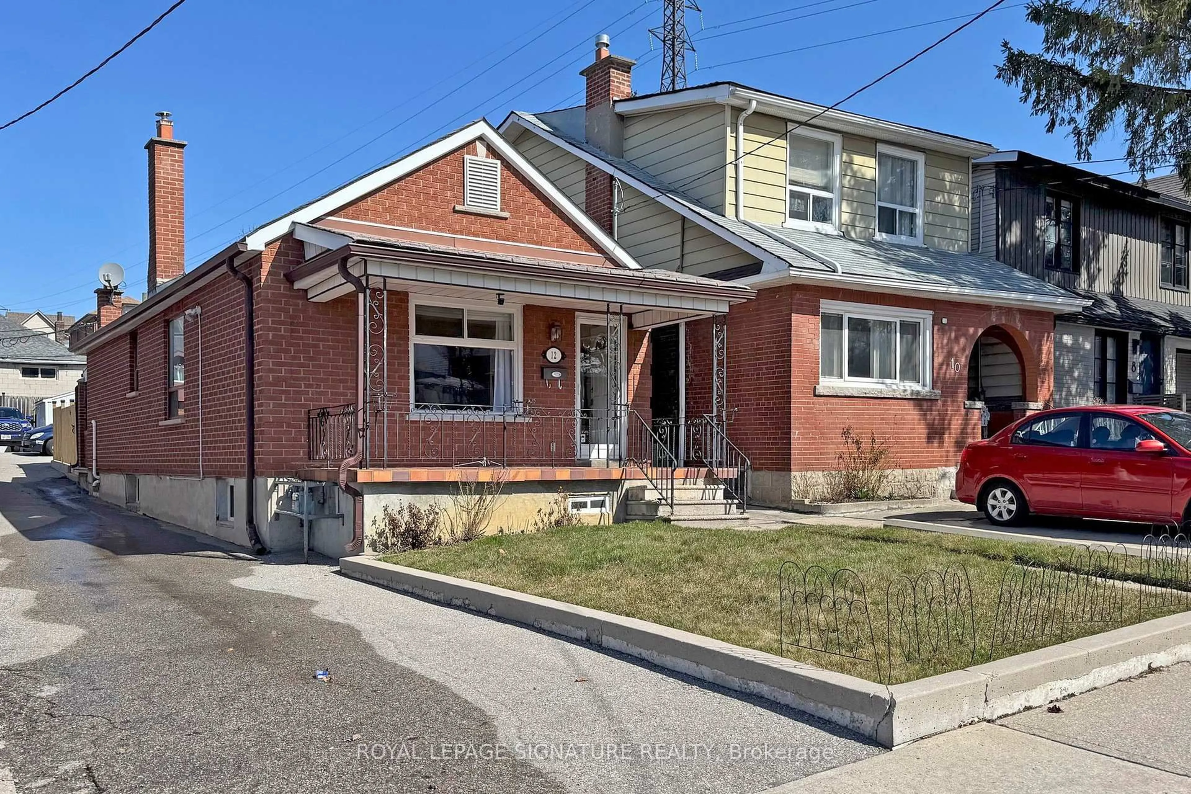 Home with brick exterior material, street for 12 Rowntree Ave, Toronto Ontario M6N 1R3