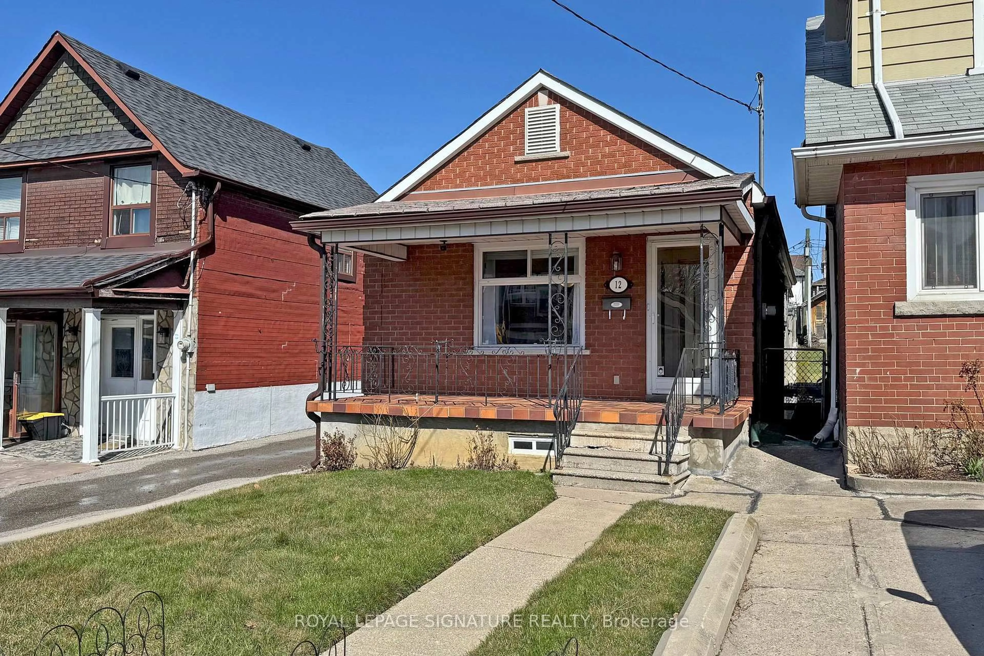 Home with brick exterior material, street for 12 Rowntree Ave, Toronto Ontario M6N 1R3
