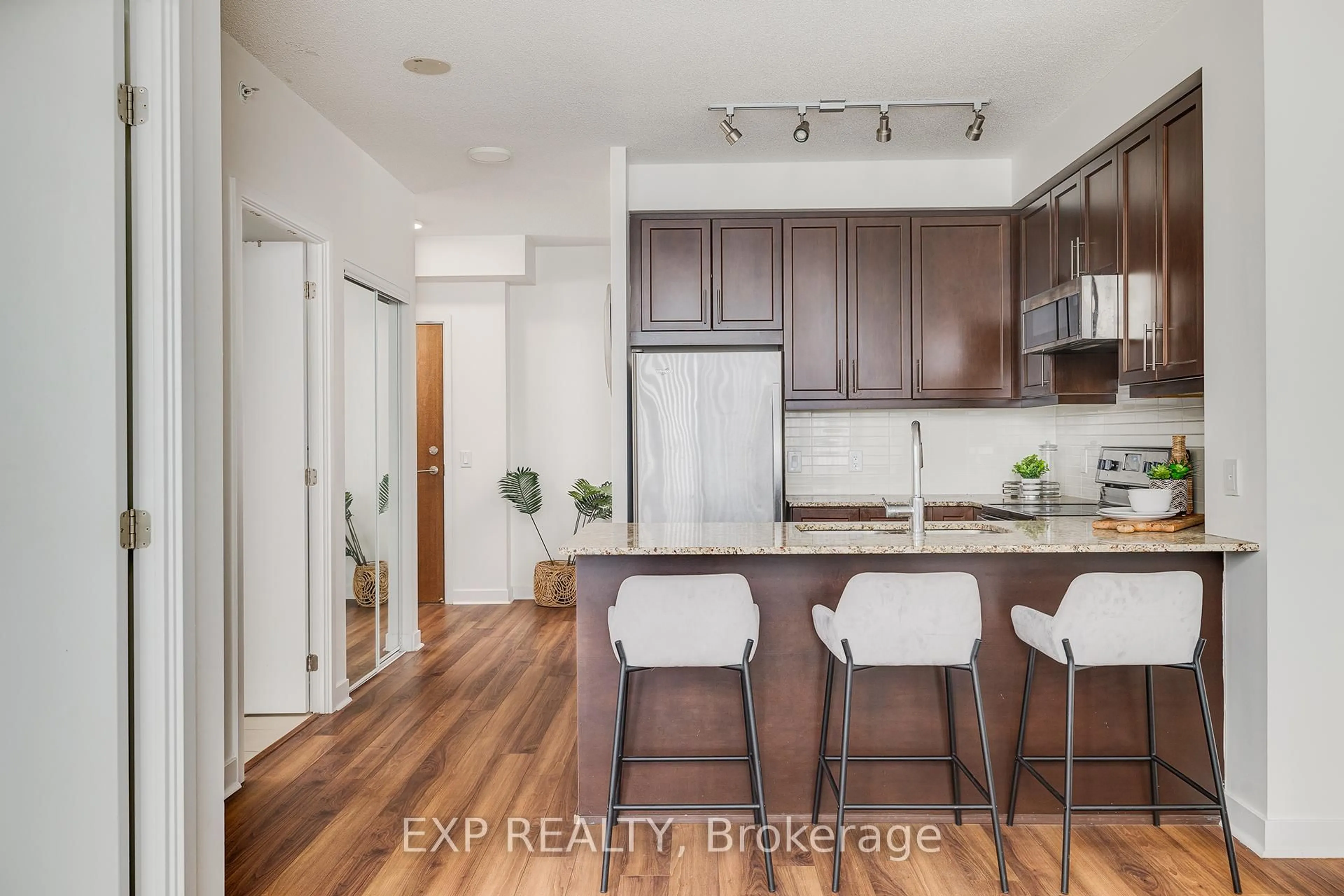 Open concept kitchen, wood/laminate floor for 3975 Grand Park Dr #3501, Mississauga Ontario L5B 0K4