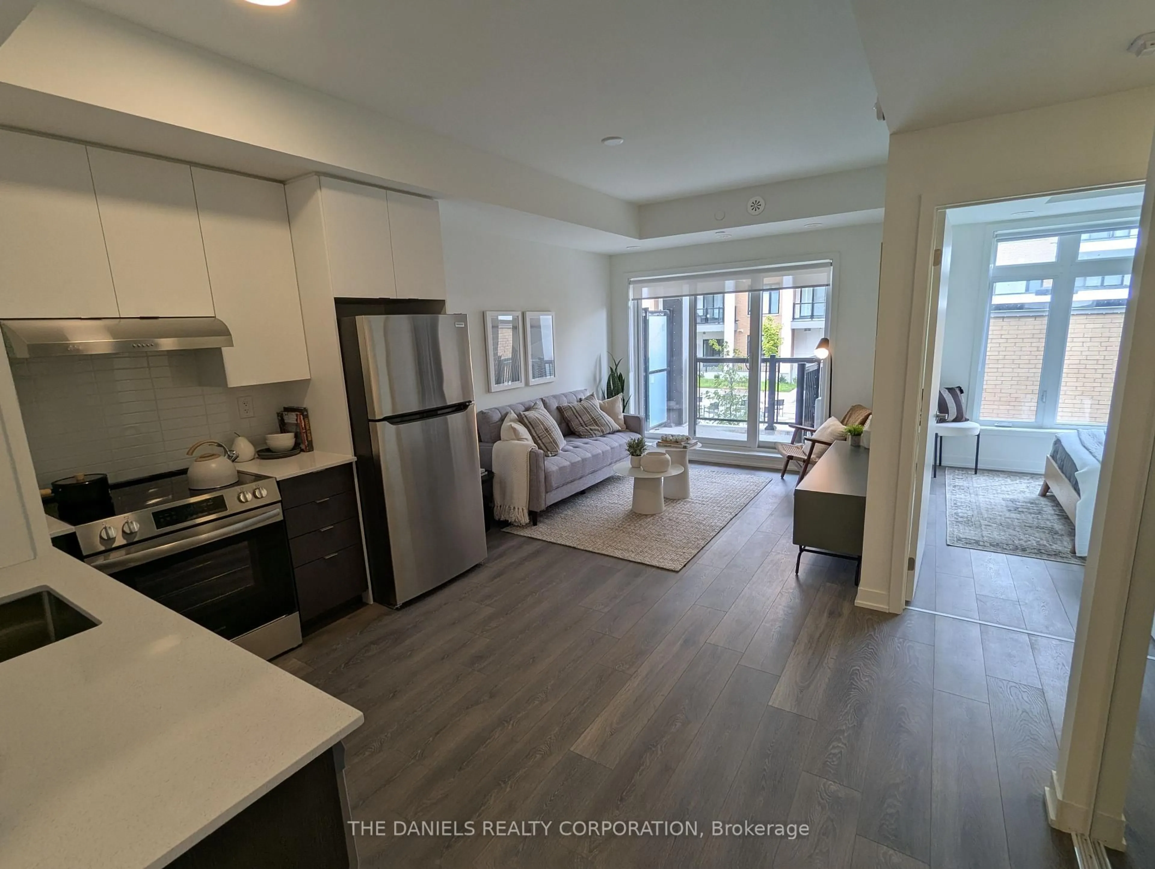 Open concept kitchen, unknown for 135 Canon Jackson Dr #214, Toronto Ontario M6M 0C3