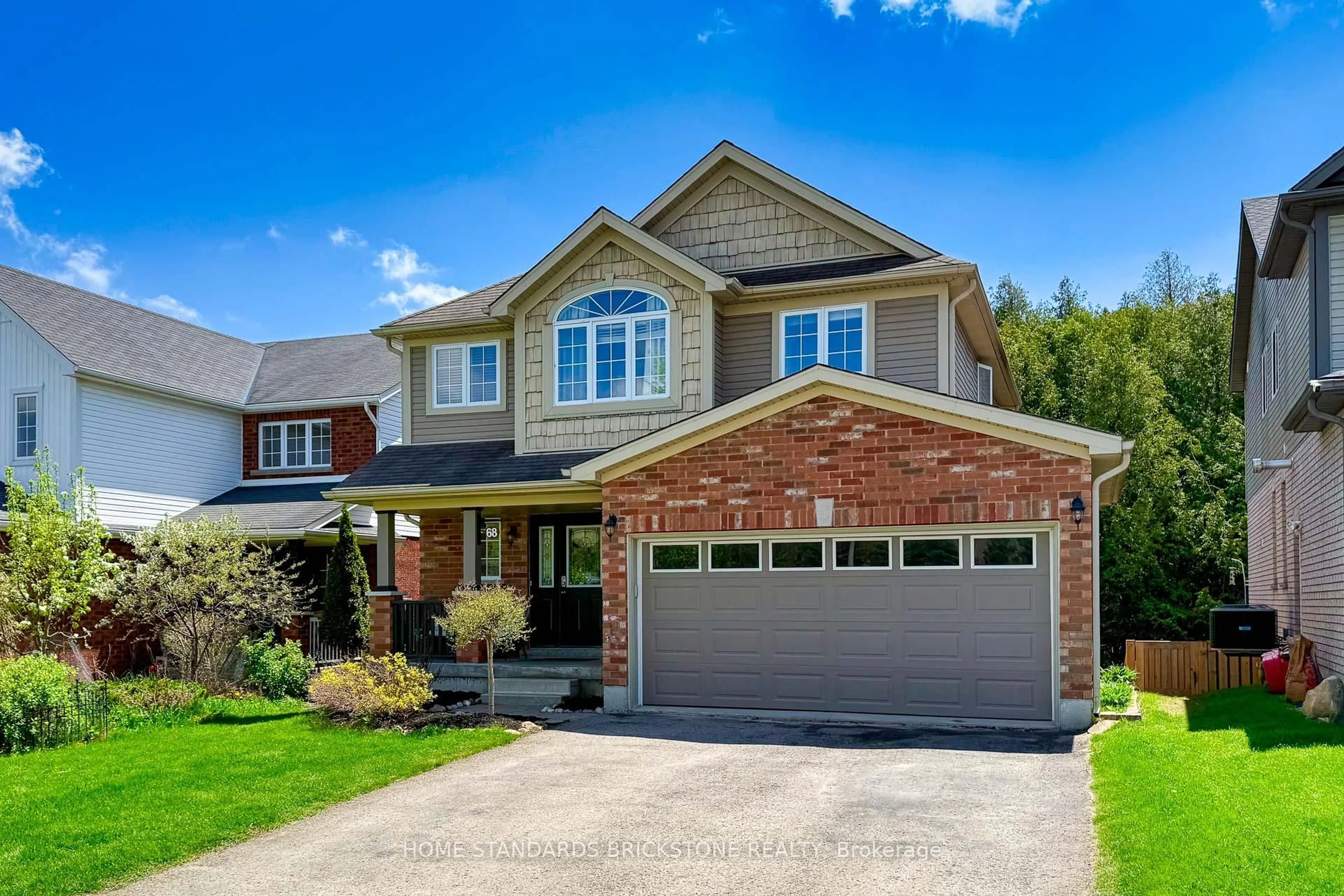 Home with brick exterior material, street for 68 Sandringham Circ, Orangeville Ontario L9W 0A6