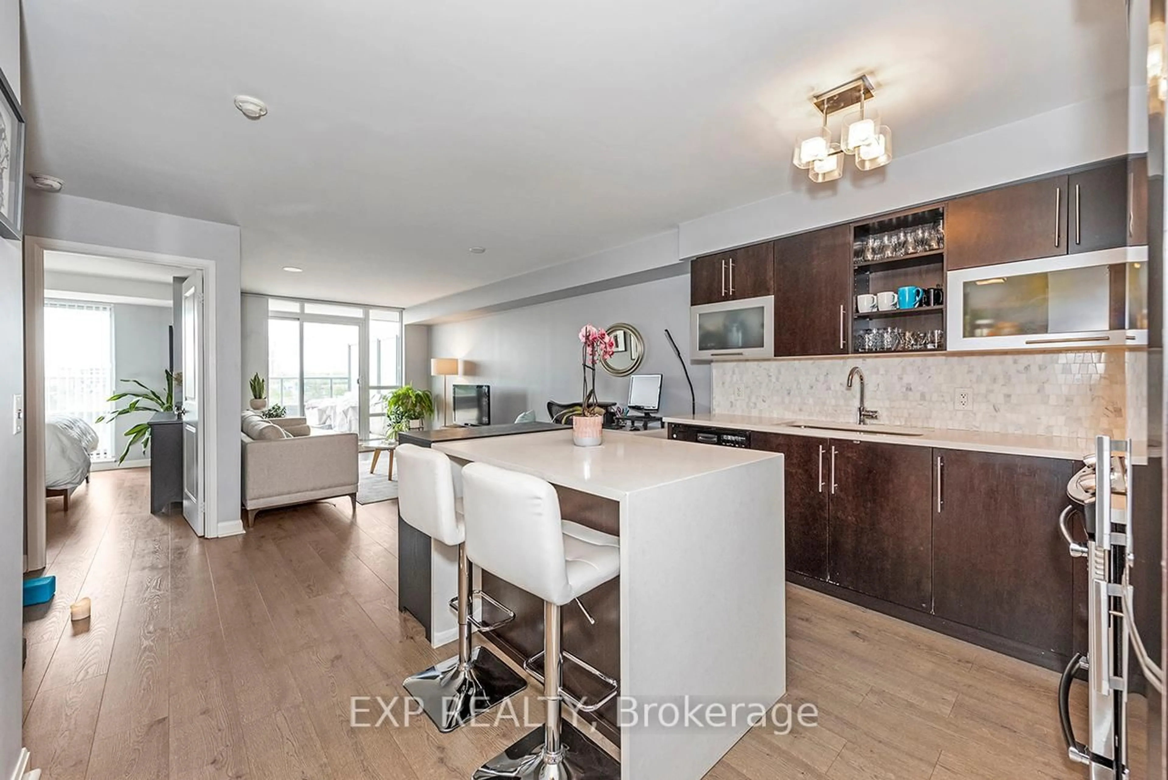 Open concept kitchen, wood/laminate floor for 1 Michael Power Pl #505, Toronto Ontario M9A 0A1