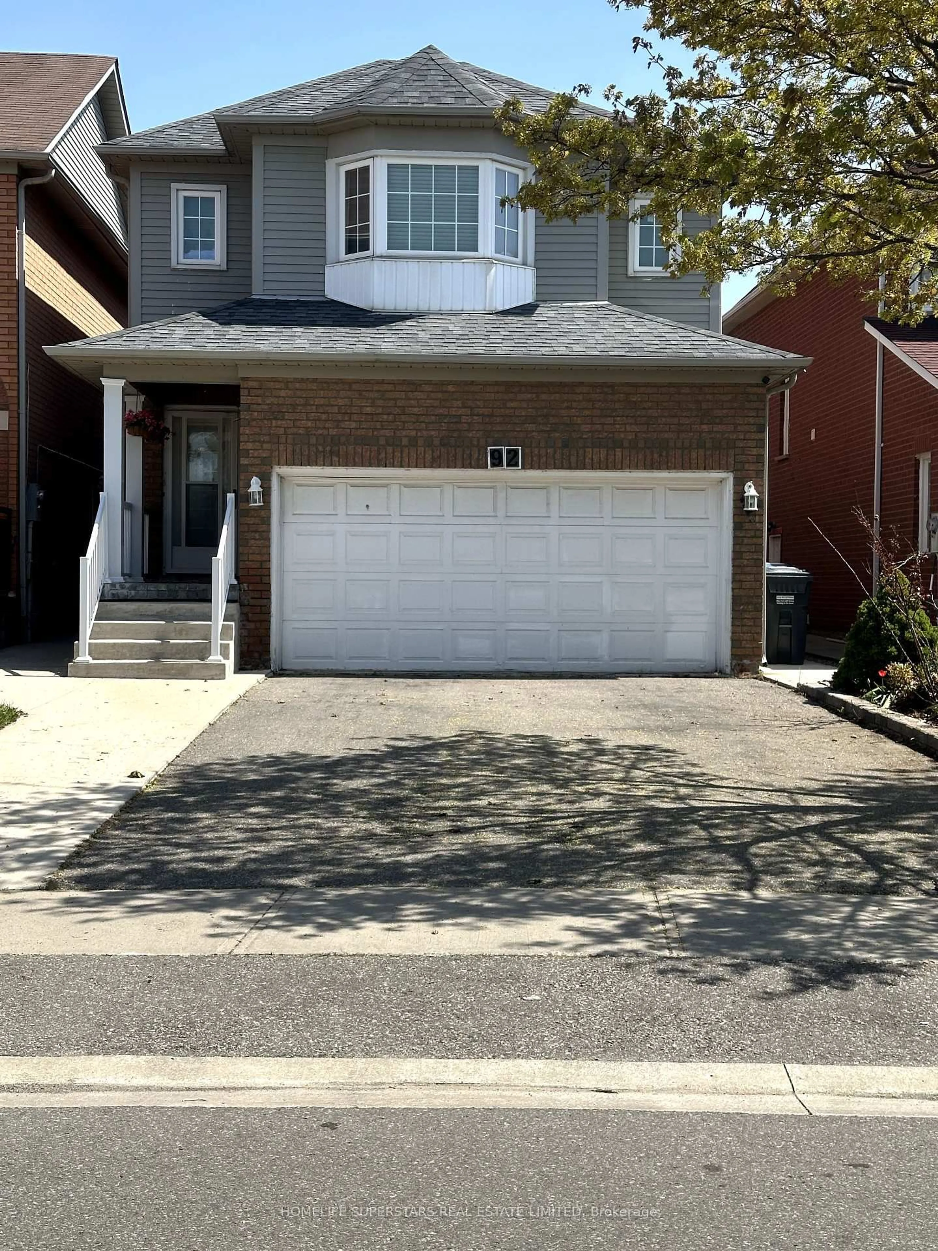 Home with brick exterior material, street for 92 Black Oak Dr, Brampton Ontario L6R 1B8