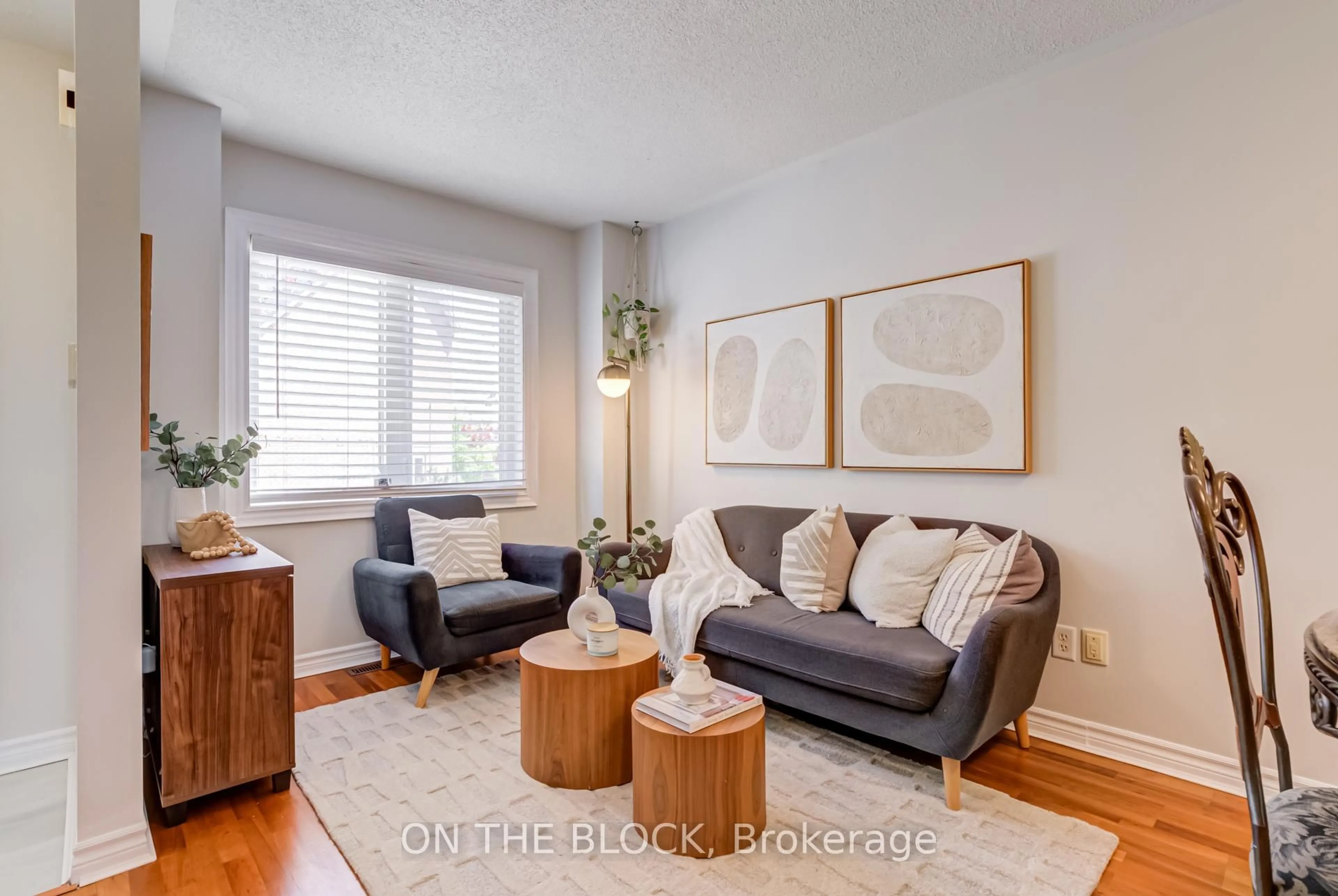 Living room with furniture, wood/laminate floor for 224 Rosemount Ave #4, Toronto Ontario M9N 1M8