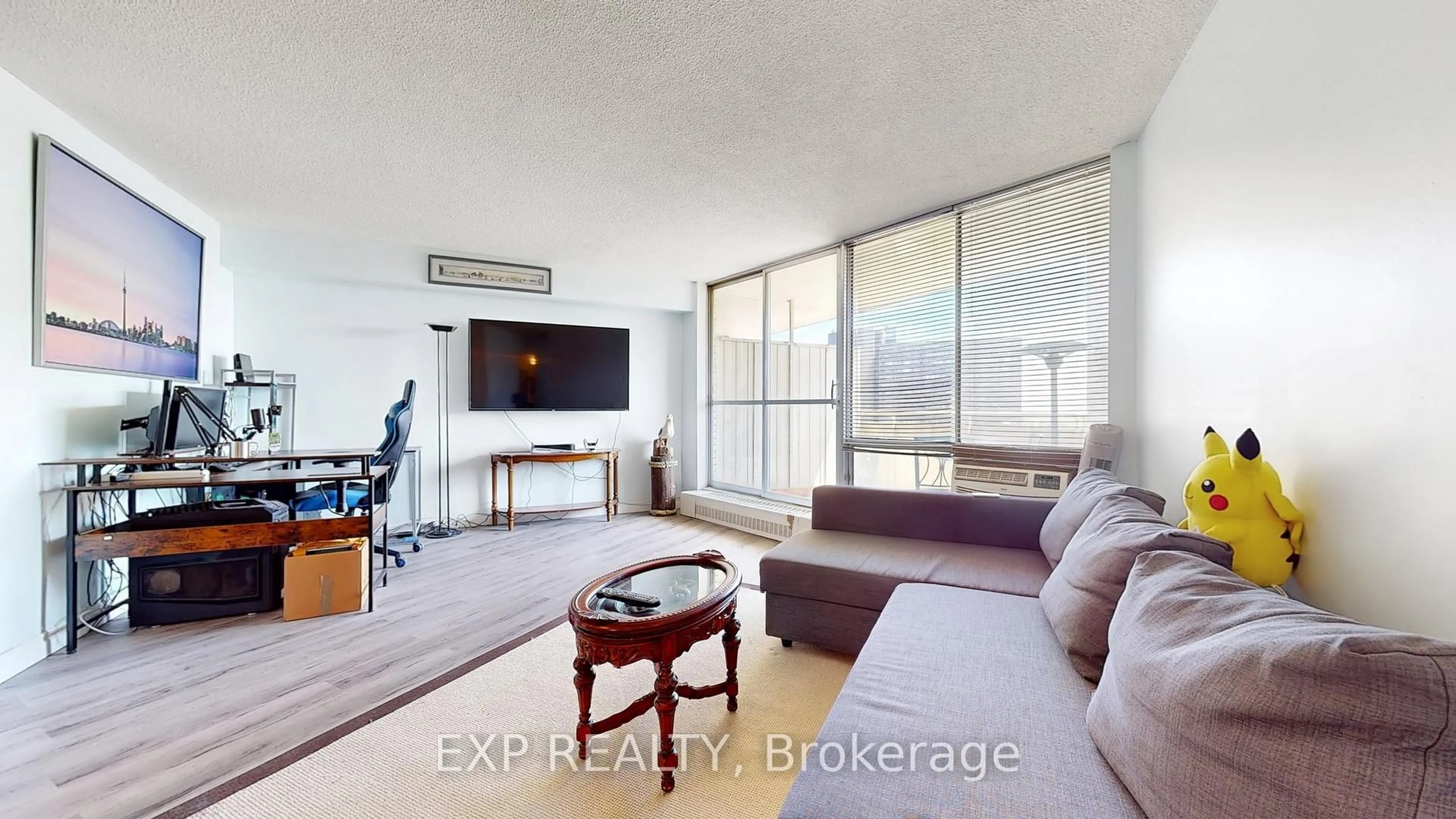 Living room with furniture, unknown for 330 Dixon Rd #1007, Toronto Ontario M9R 1S9