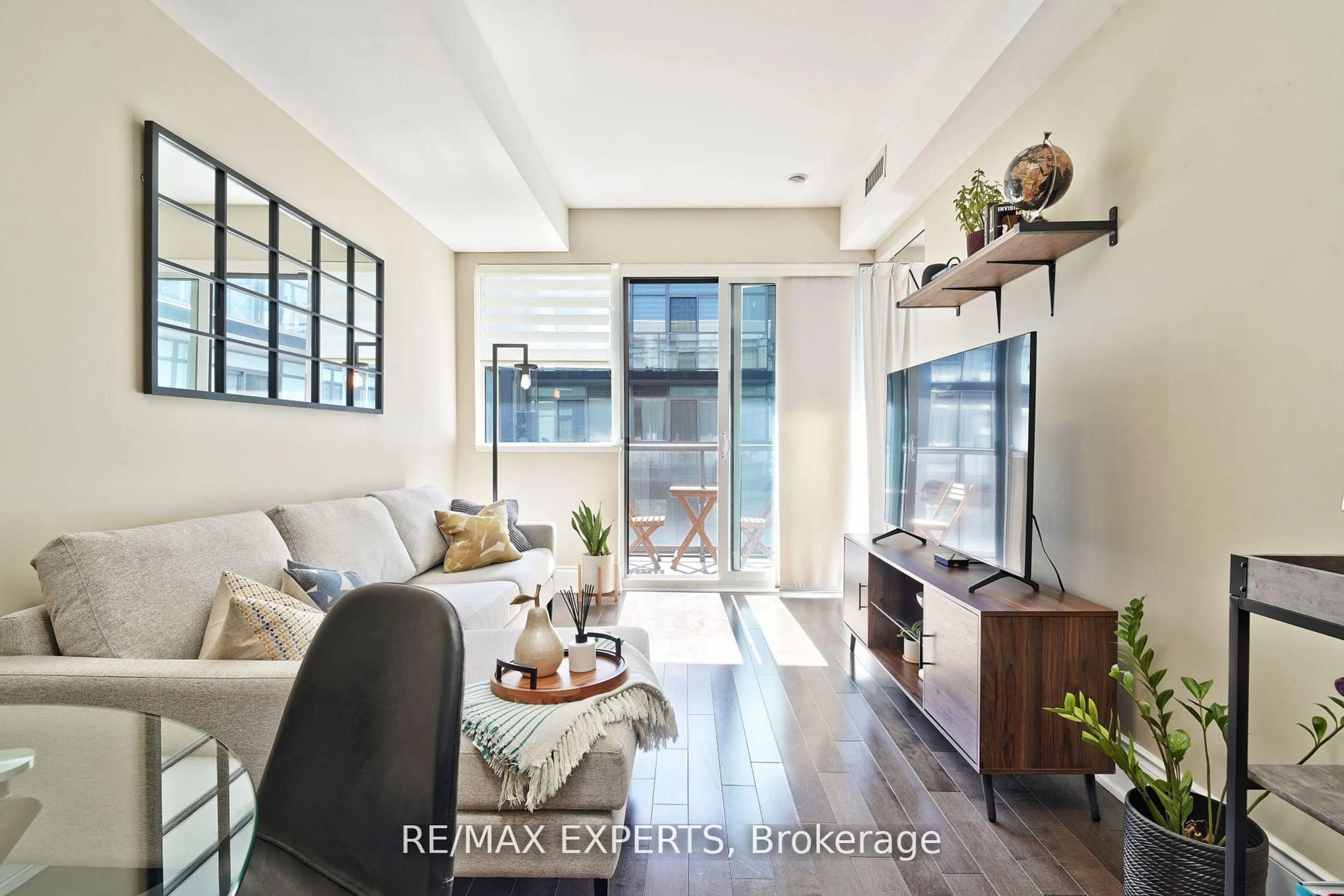 Living room with furniture, unknown for 15 James Finlay Way #1017, Toronto Ontario M3M 0A2