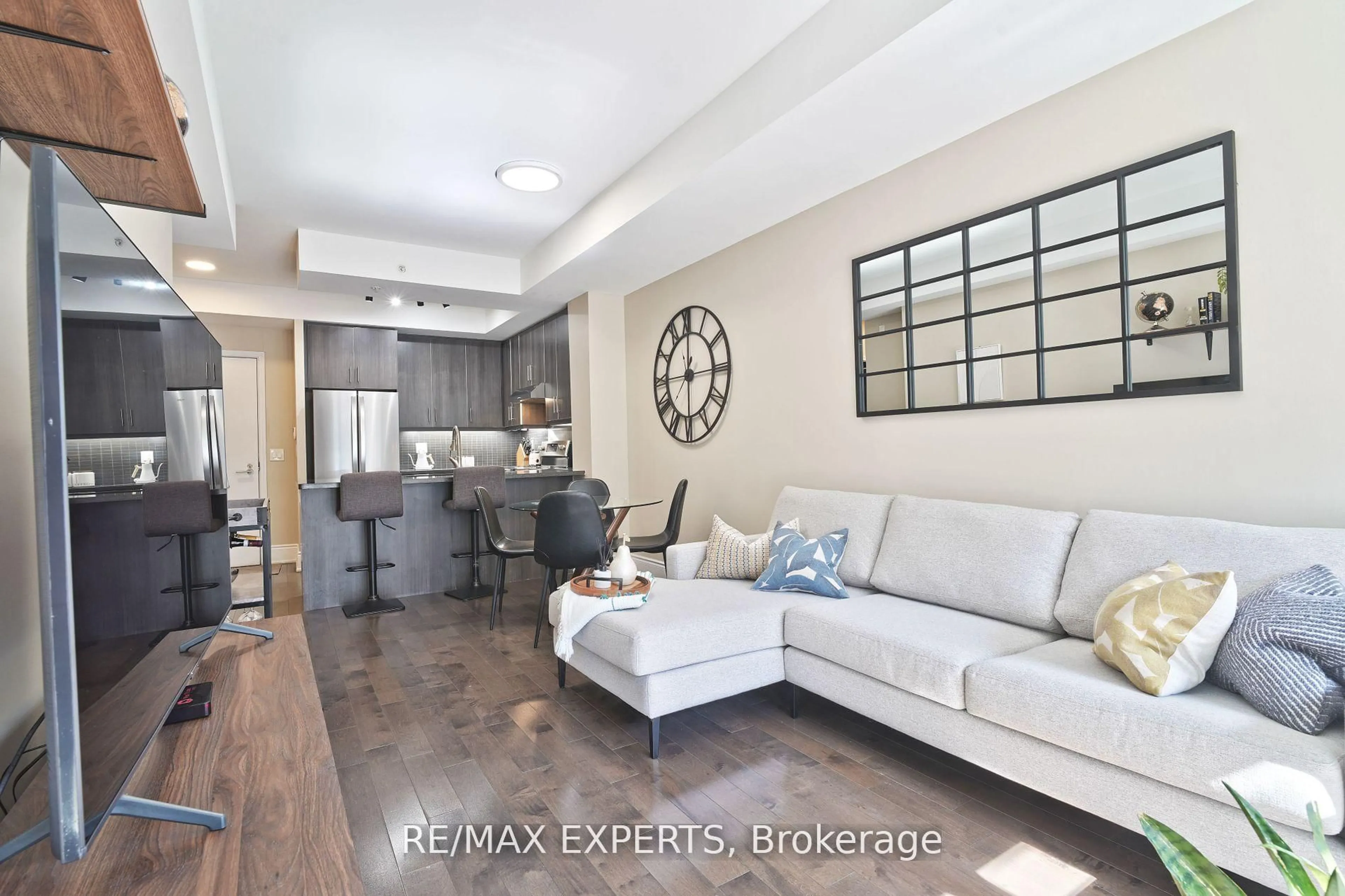 Living room with furniture, unknown for 15 James Finlay Way #1017, Toronto Ontario M3M 0A2