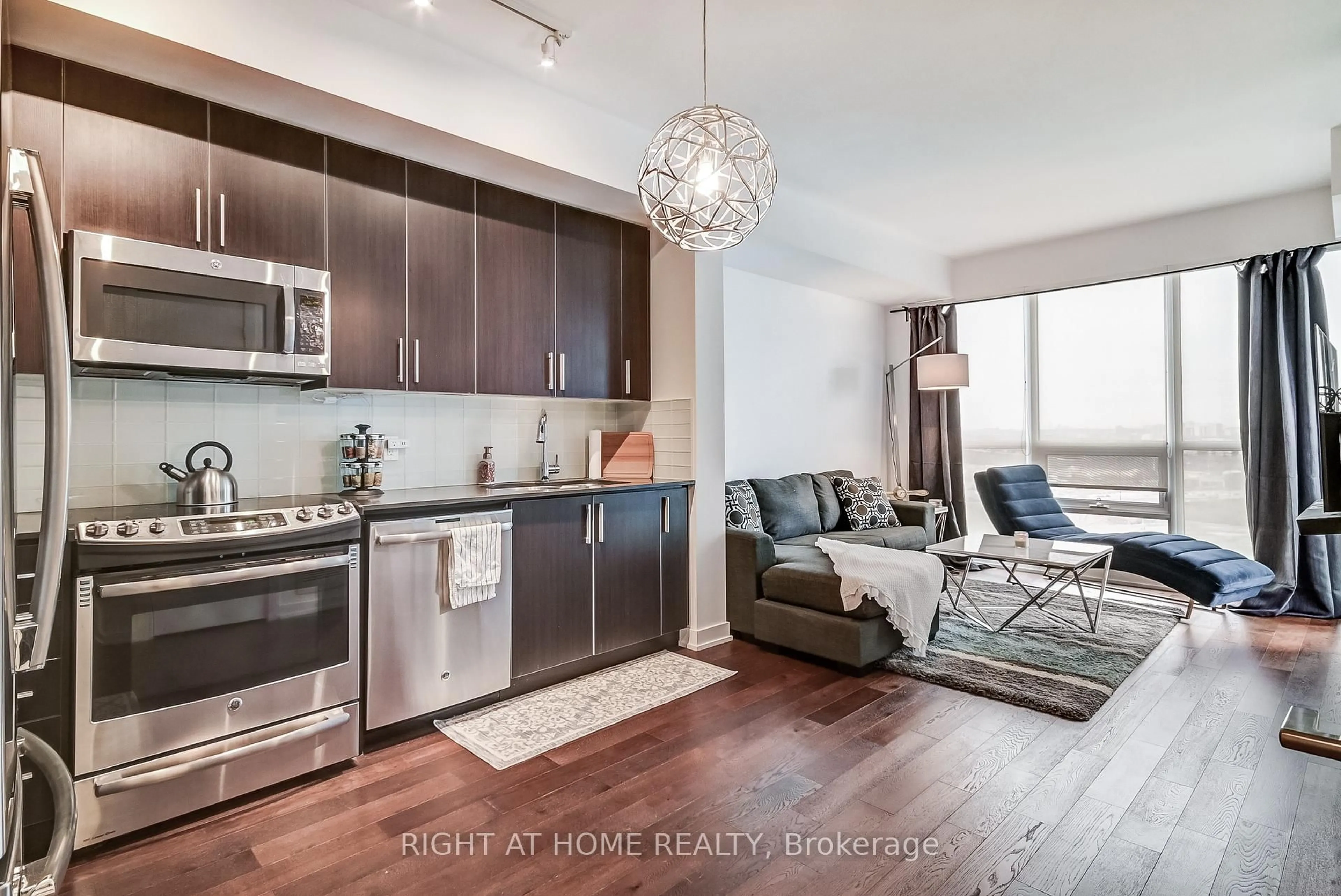 Open concept kitchen, wood/laminate floor for 2212 Lake Shore Blvd #2710, Toronto Ontario M8V 1A4