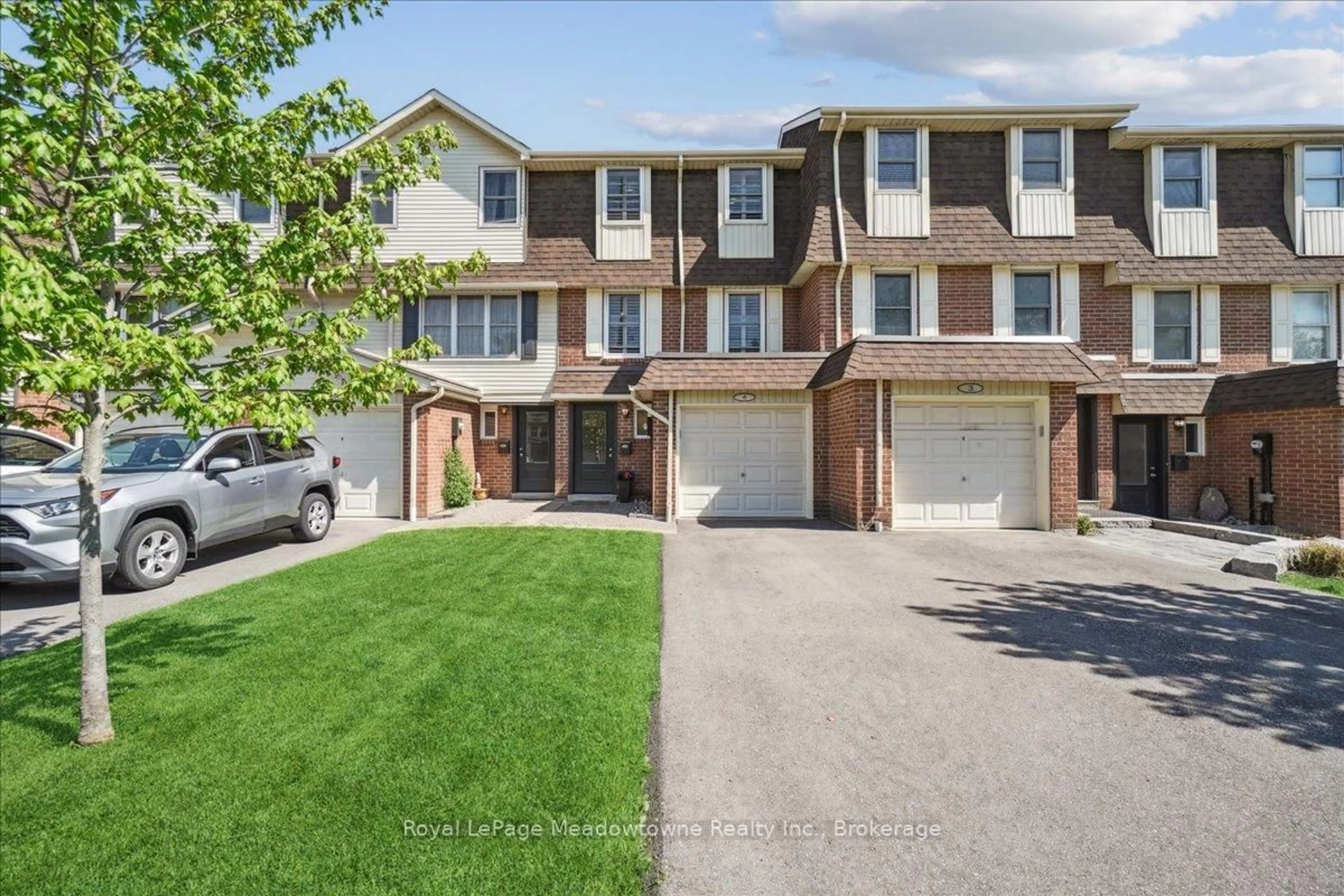 A pic from outside/outdoor area/front of a property/back of a property/a pic from drone, street for 30 Heslop Rd #4, Milton Ontario L9T 1B3