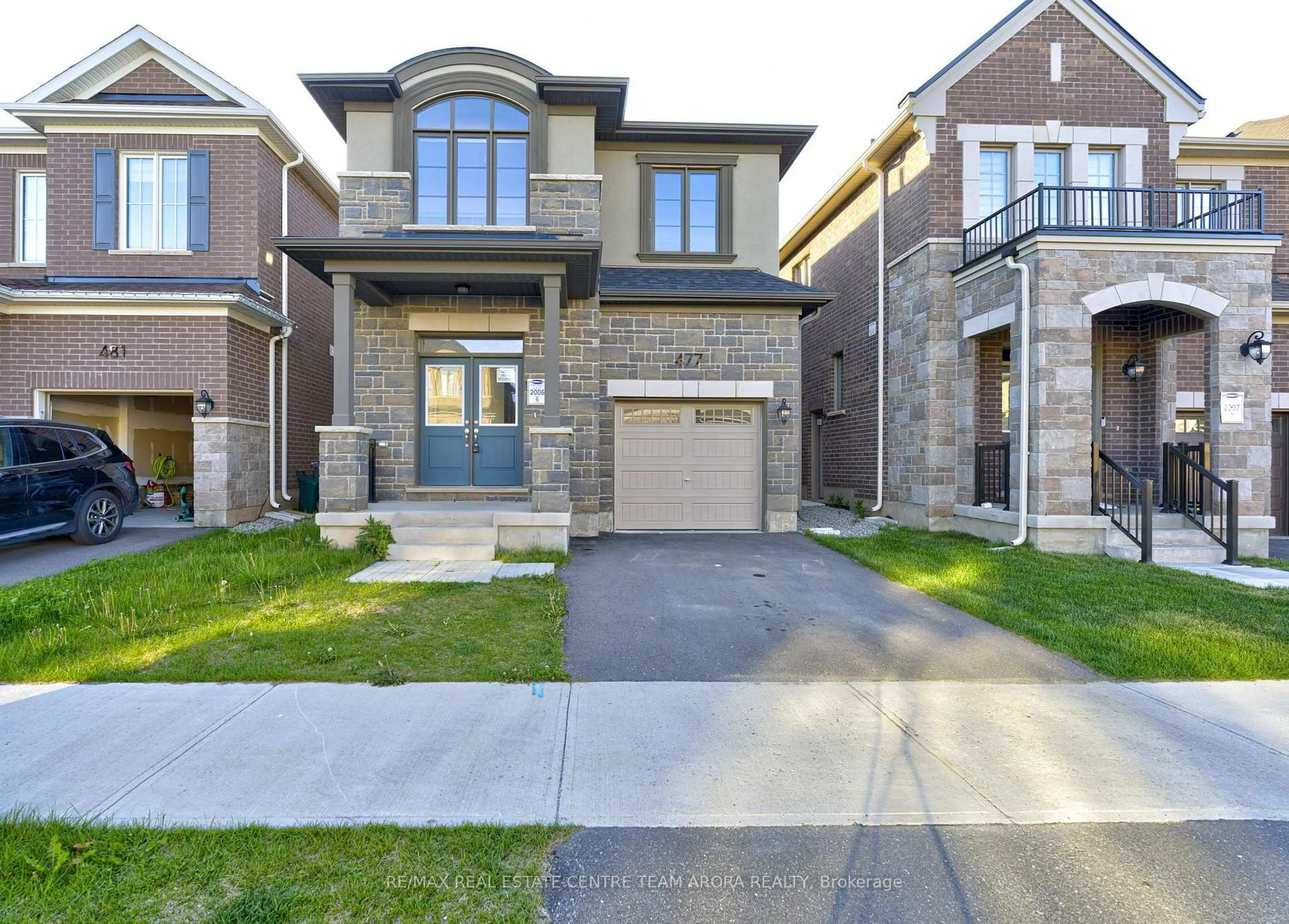 Home with brick exterior material, street for 477 Boyd Lane, Milton Ontario L9E 1X2