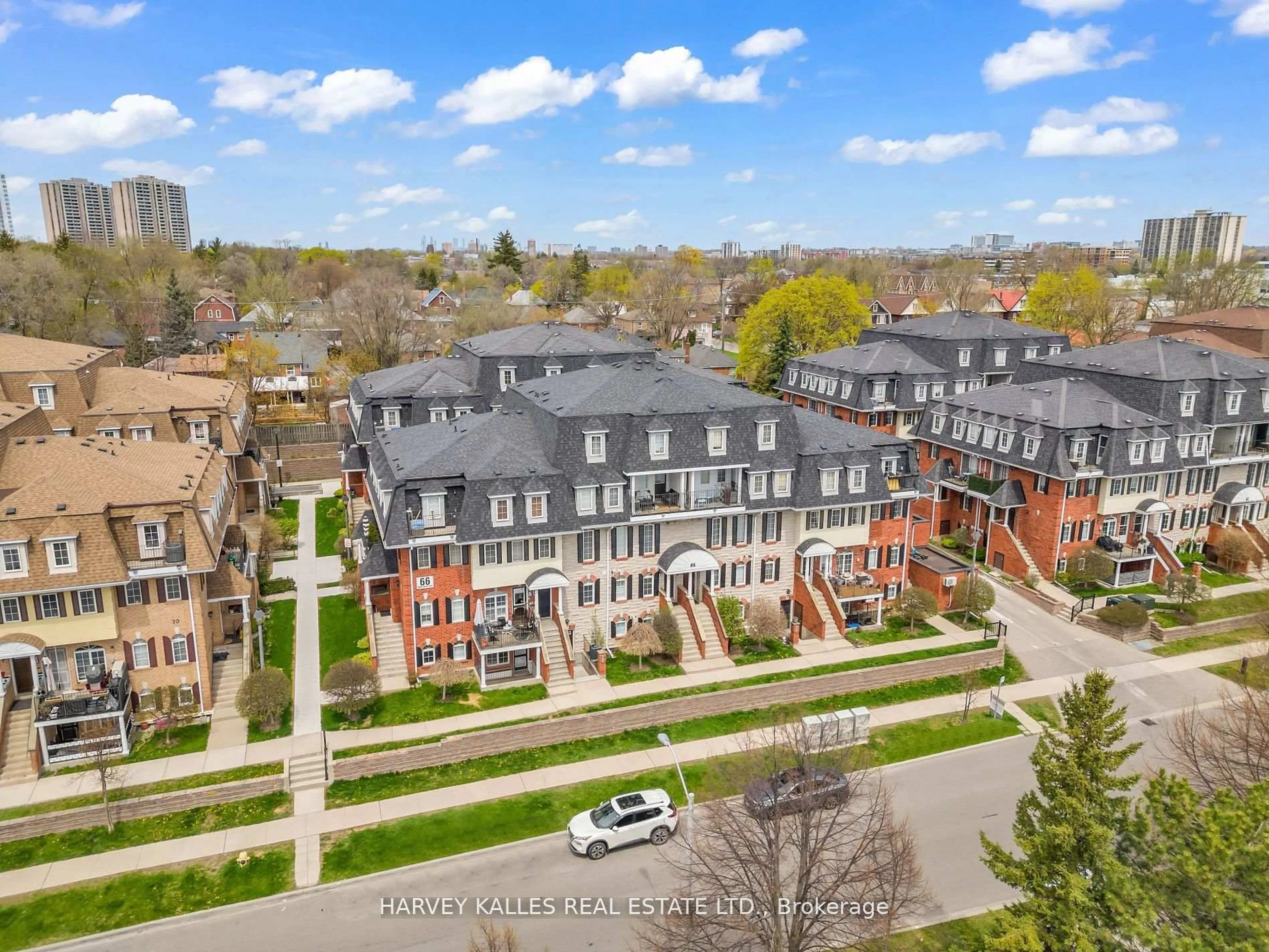 A pic from outside/outdoor area/front of a property/back of a property/a pic from drone, city buildings view from balcony for 66 Sidney Belsey Cres #201, Toronto Ontario M6M 5J4