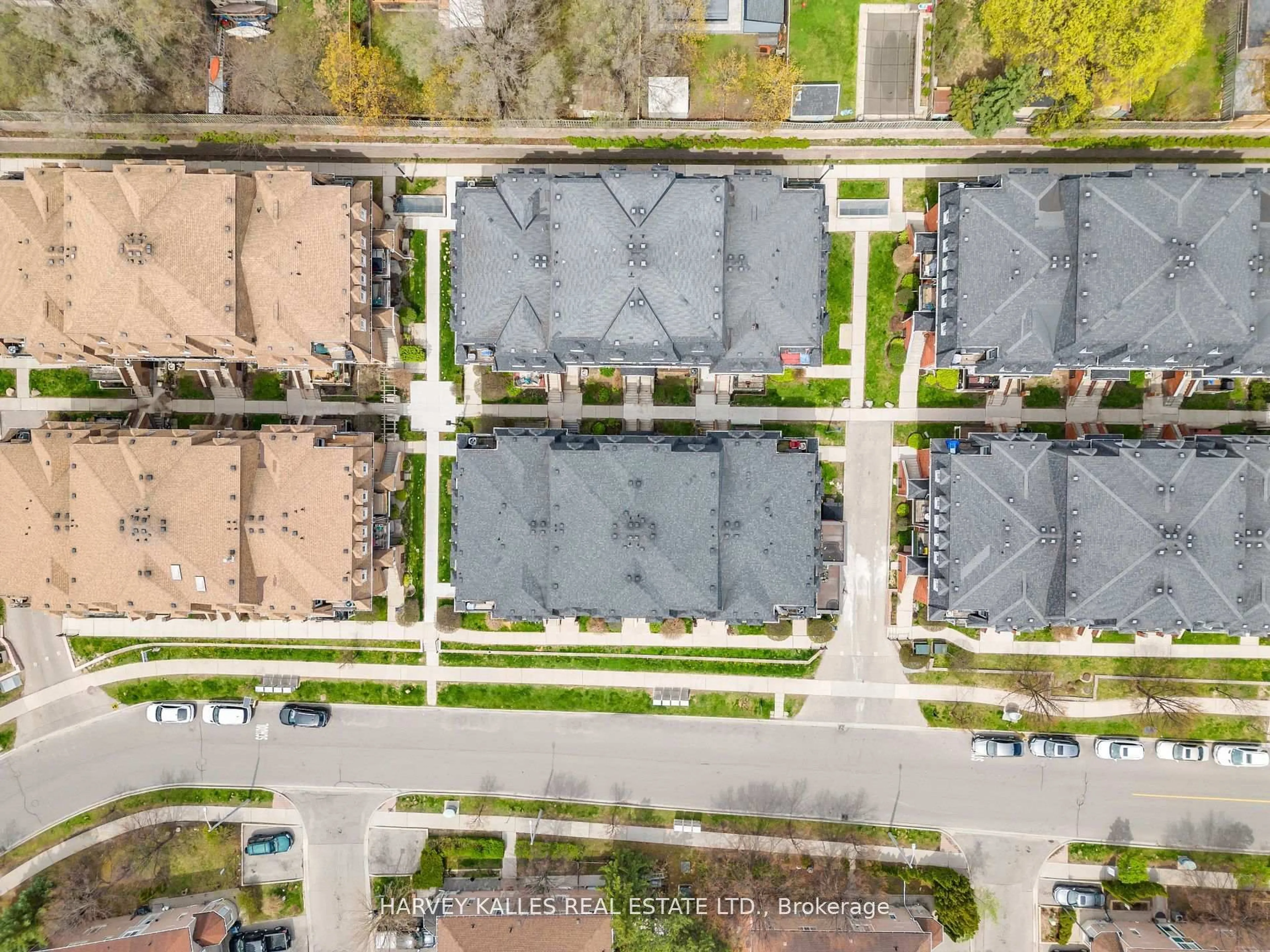 A pic from outside/outdoor area/front of a property/back of a property/a pic from drone, street for 66 Sidney Belsey Cres #201, Toronto Ontario M6M 5J4
