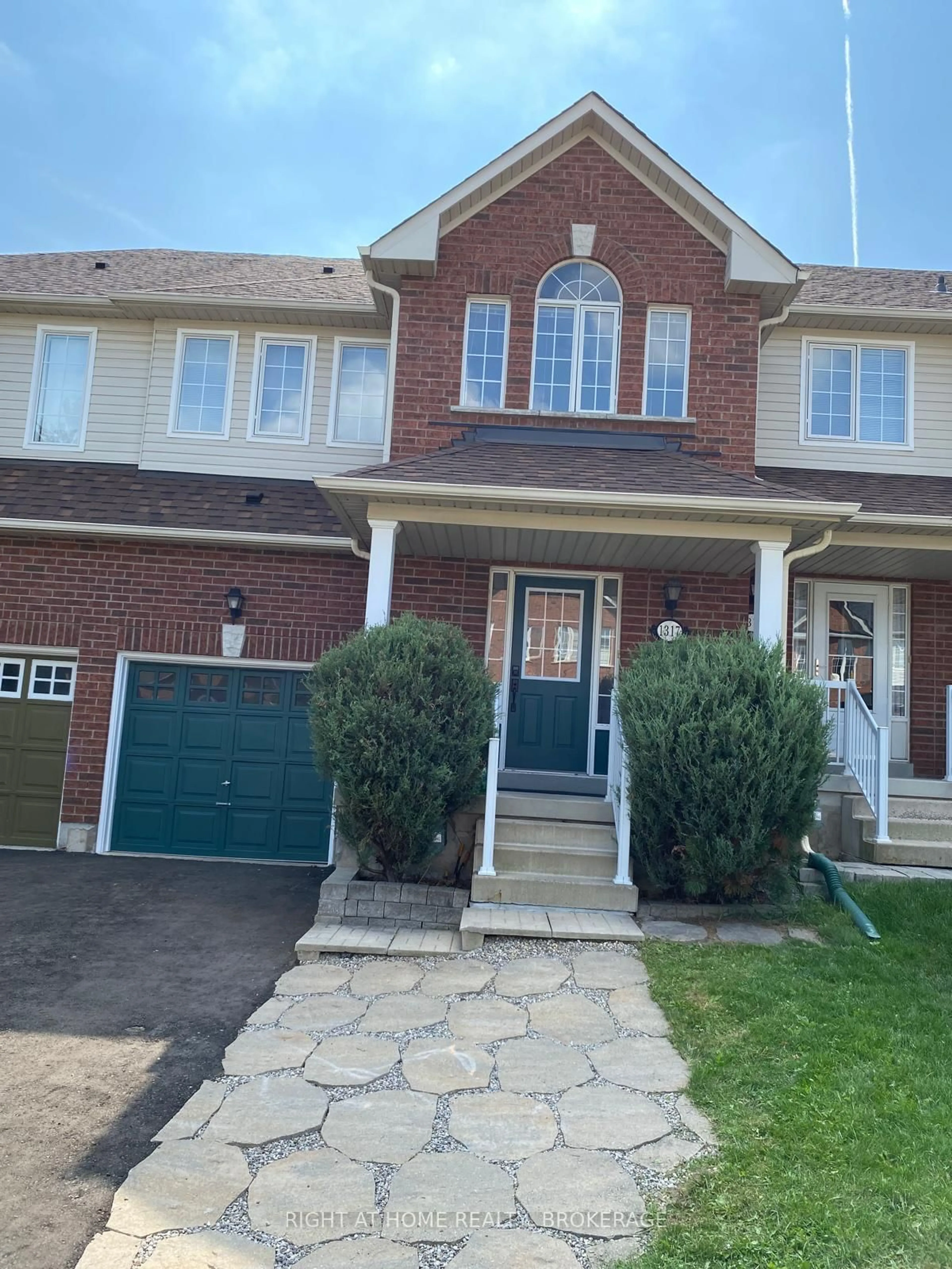 Home with brick exterior material, street for 1317 Cartmer Way, Milton Ontario L9T 6J9