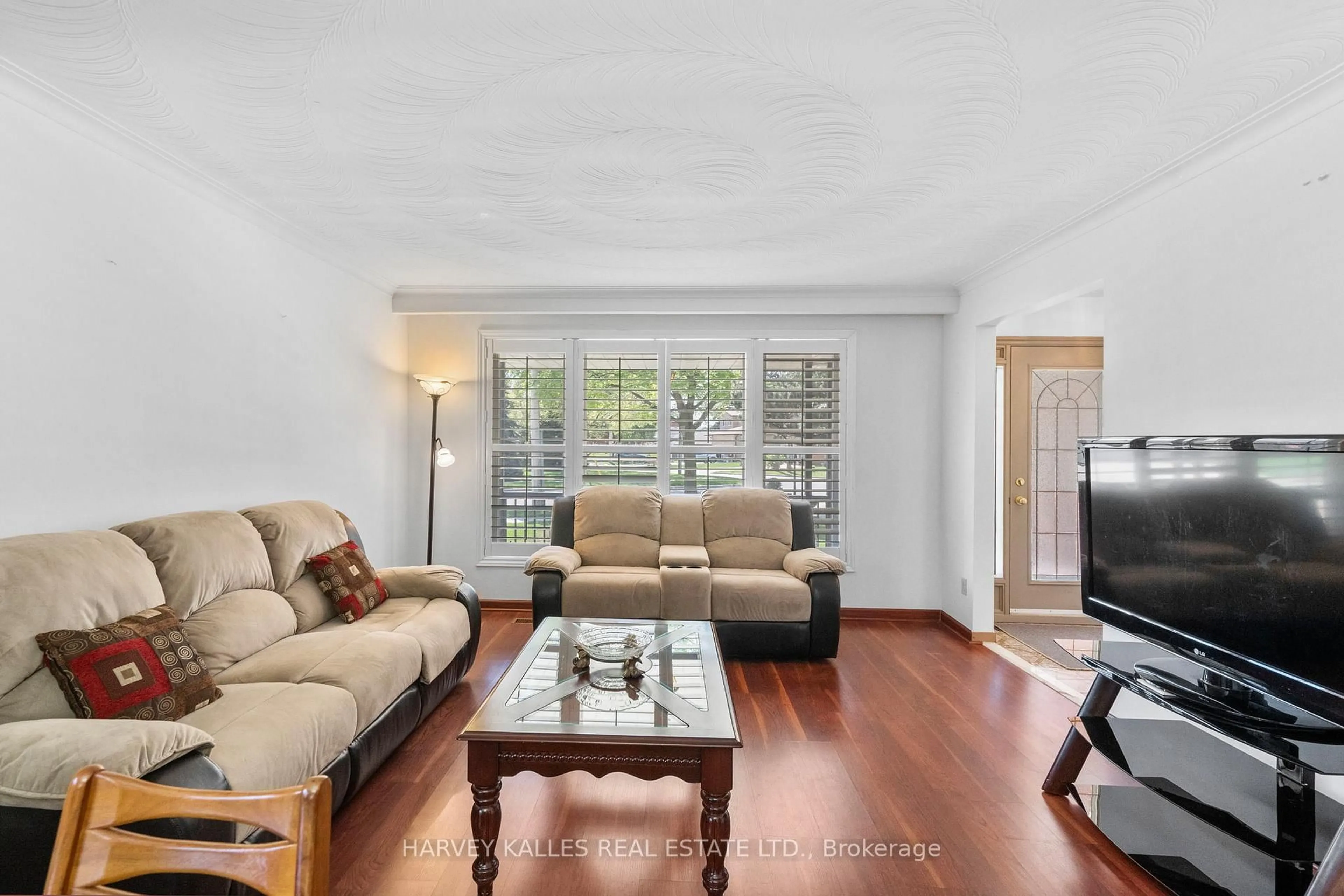 Living room with furniture, unknown for 26 Embers Dr, Toronto Ontario M9C 3E7