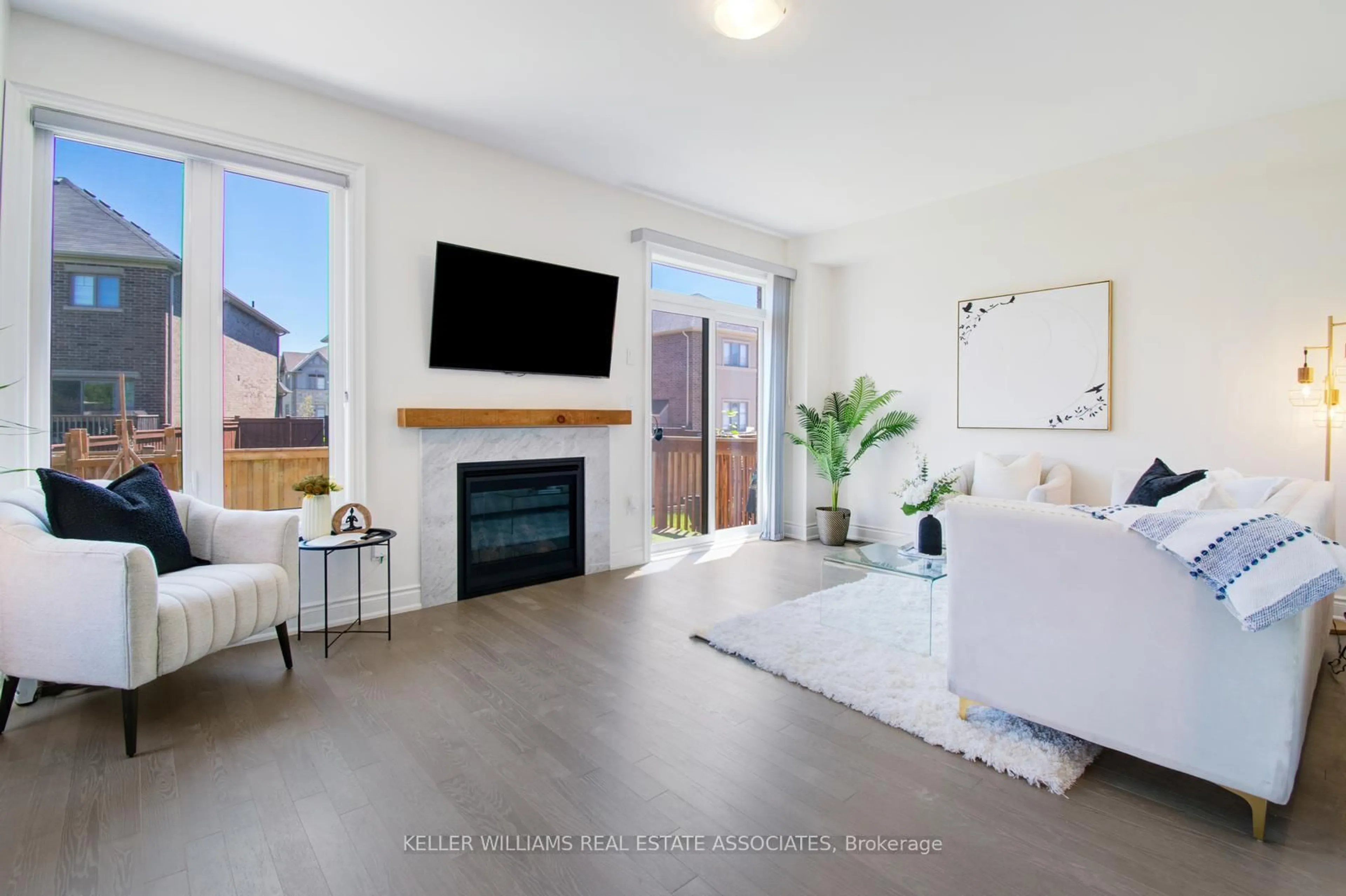 Living room with furniture, wood/laminate floor for 5 Quinton Rdge, Brampton Ontario L6Y 6J4