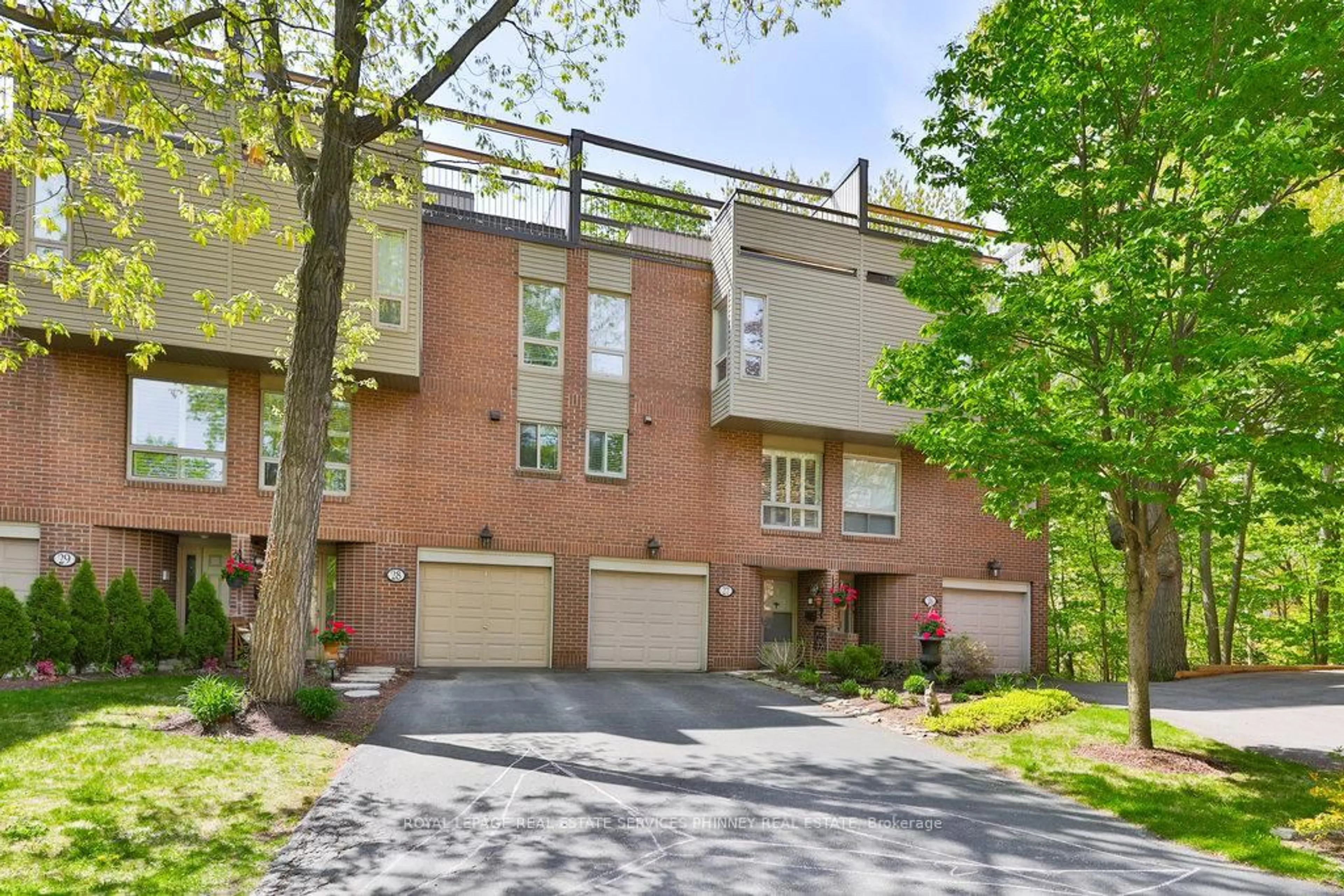 Home with brick exterior material, street for 1250 Marlborough Crt #27, Oakville Ontario L6H 2W7