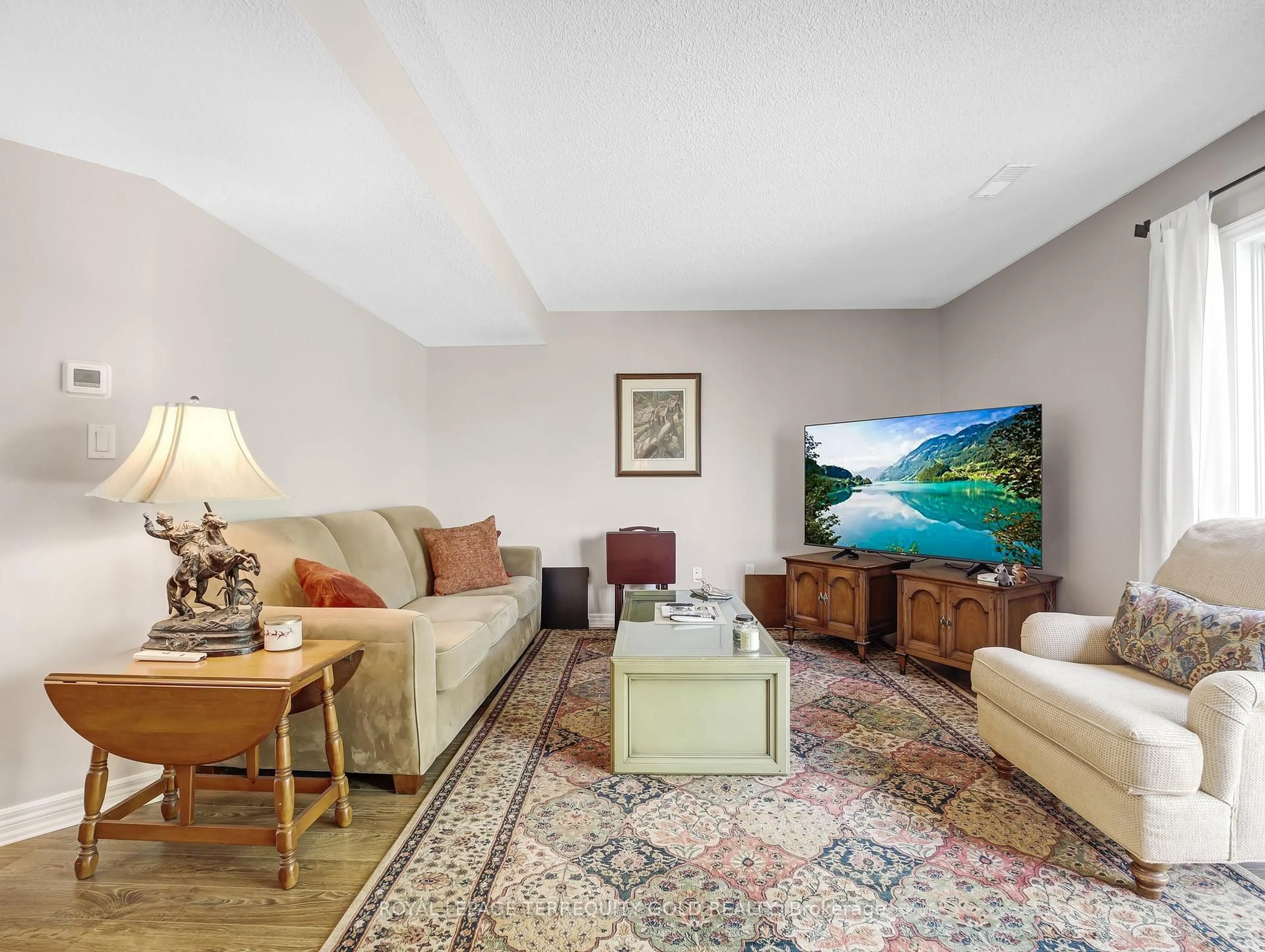 Living room with furniture, unknown for 4045 Upper Middle Rd #51, Burlington Ontario L7M 4S9