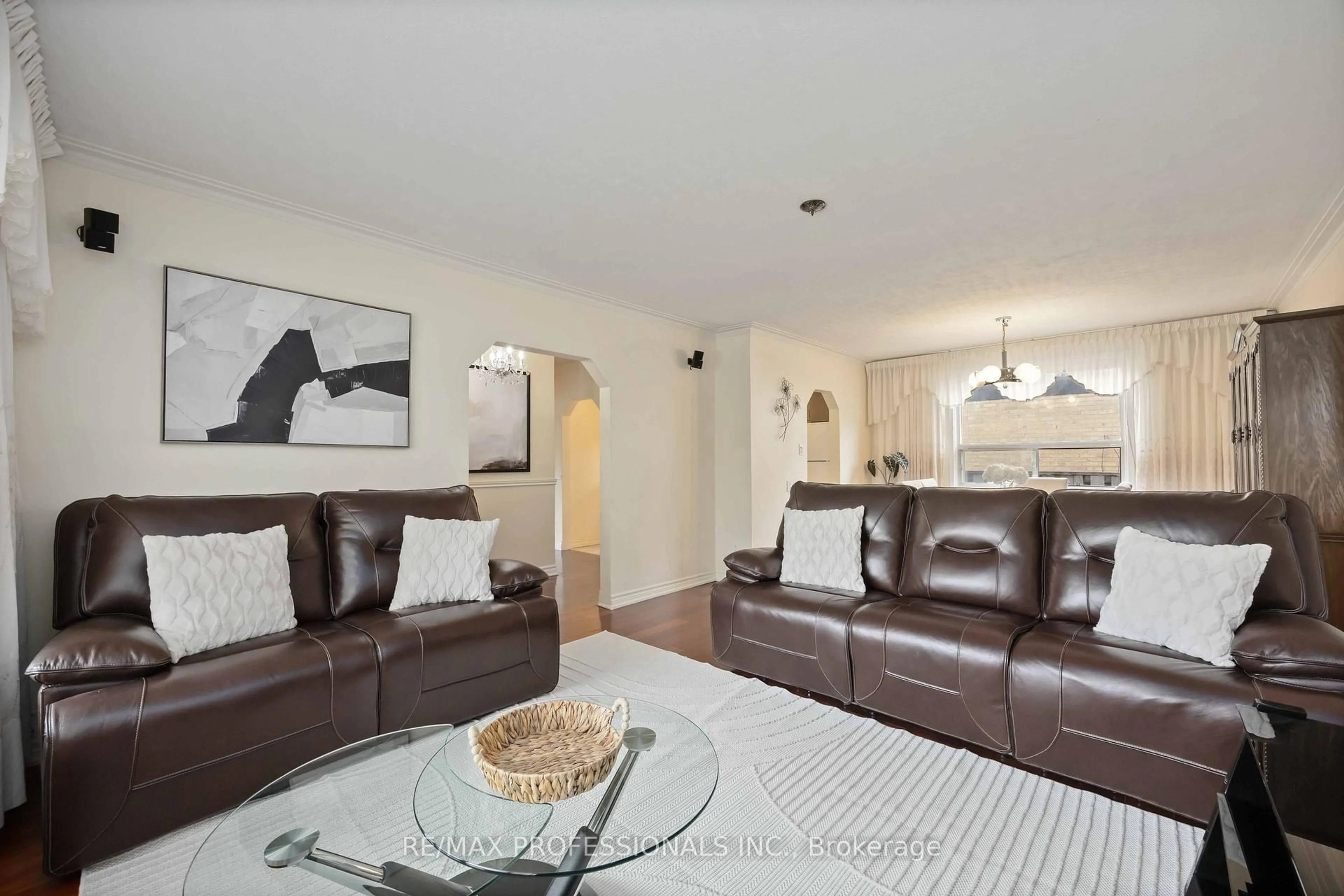Living room with furniture, wood/laminate floor for 2 Coolhurst Dr, Toronto Ontario M9W 4A5