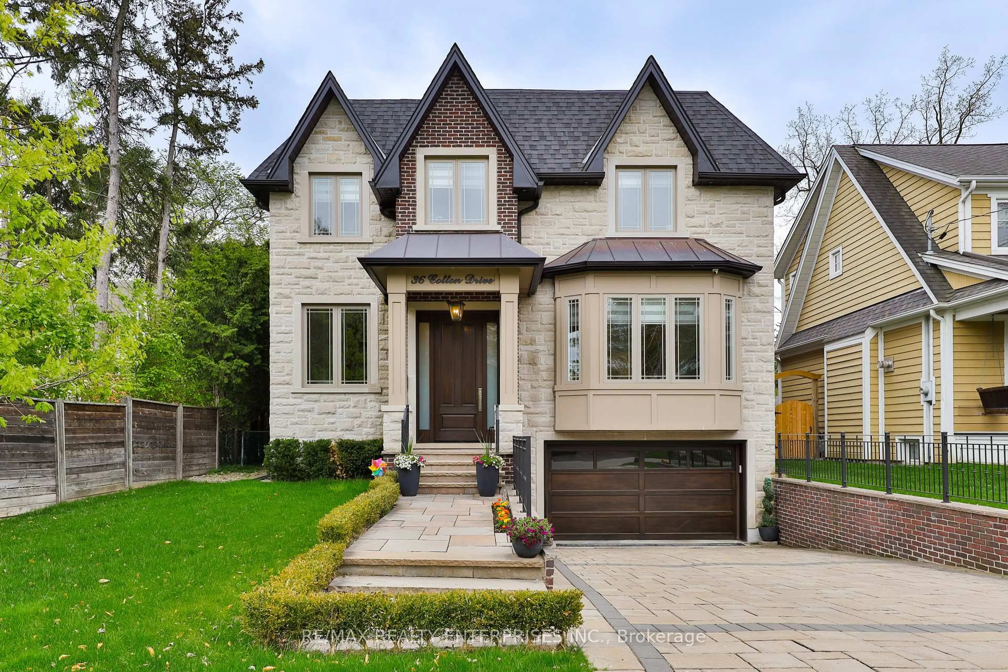 Home with brick exterior material, street for 36 Cotton Dr, Mississauga Ontario L5G 1Z9