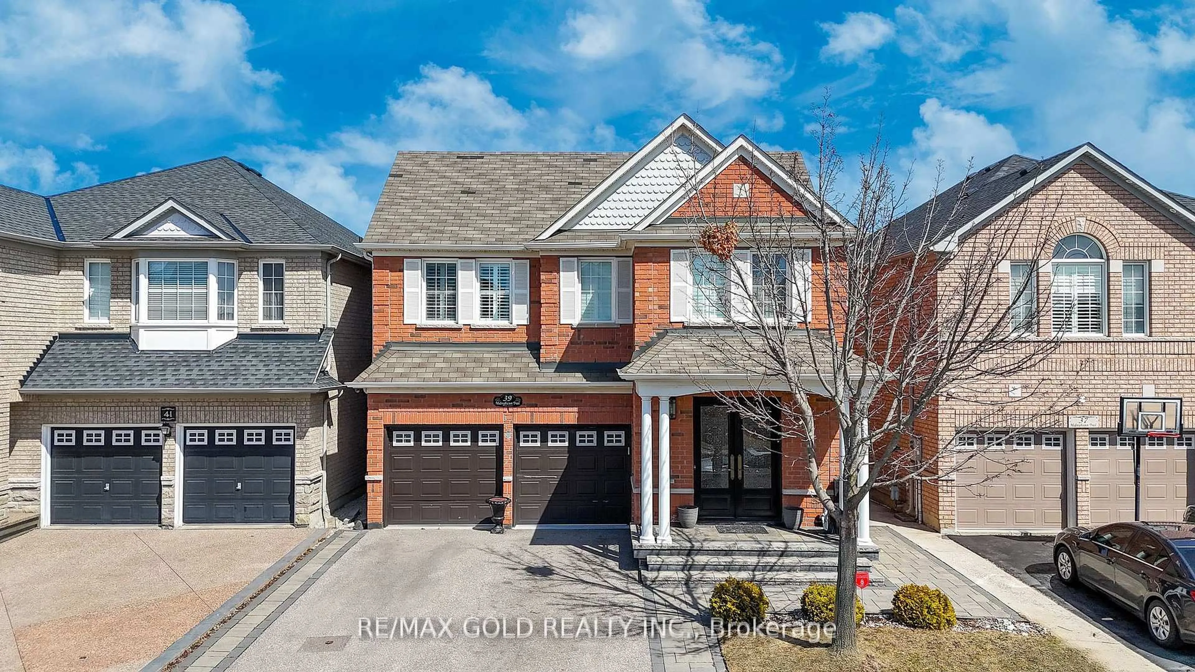 Home with brick exterior material, street for 39 Midnightsun Tr, Brampton Ontario L6R 3K3