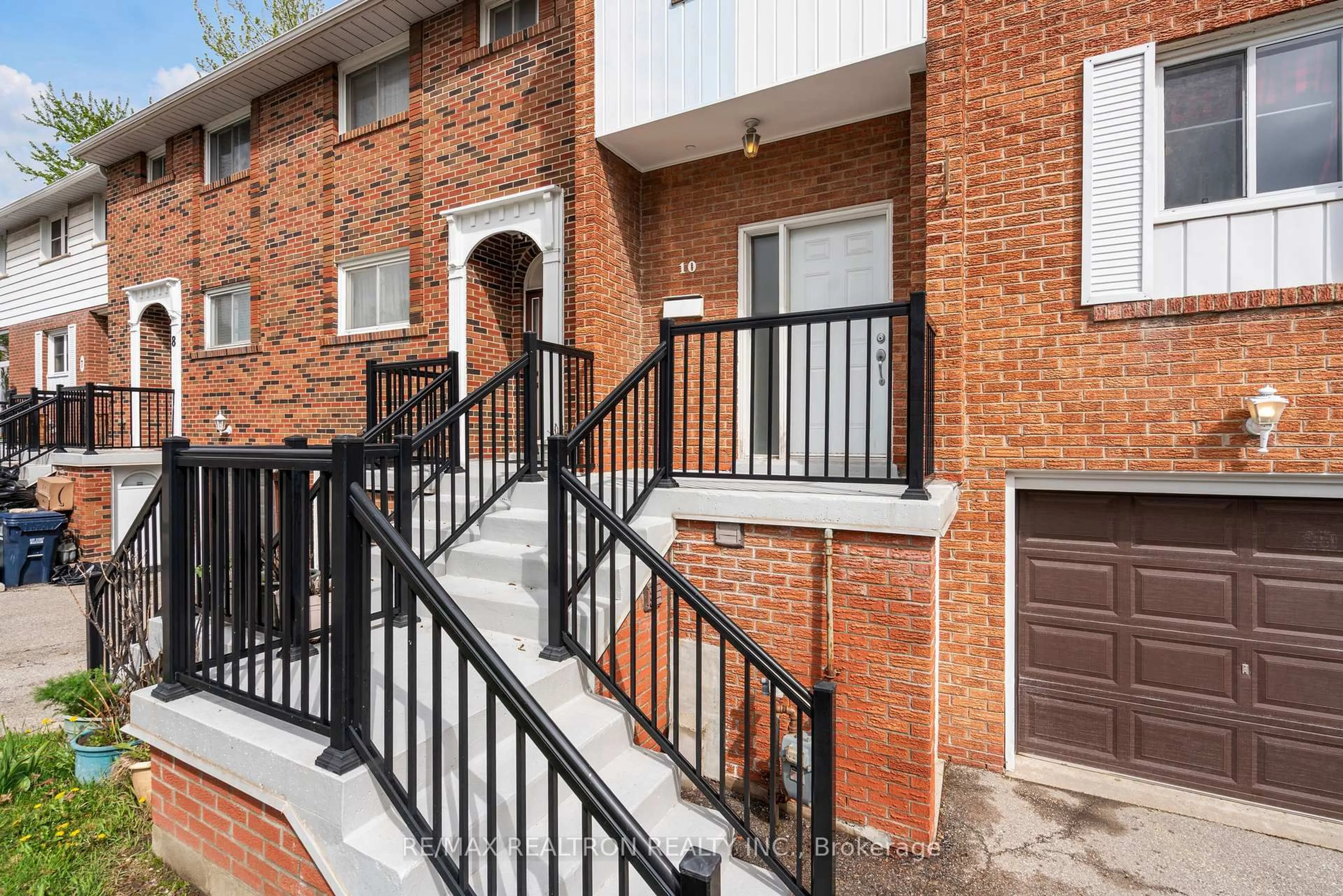 Home with brick exterior material, street for 19 Centennial Park Rd #10, Toronto Ontario M9C 4W8