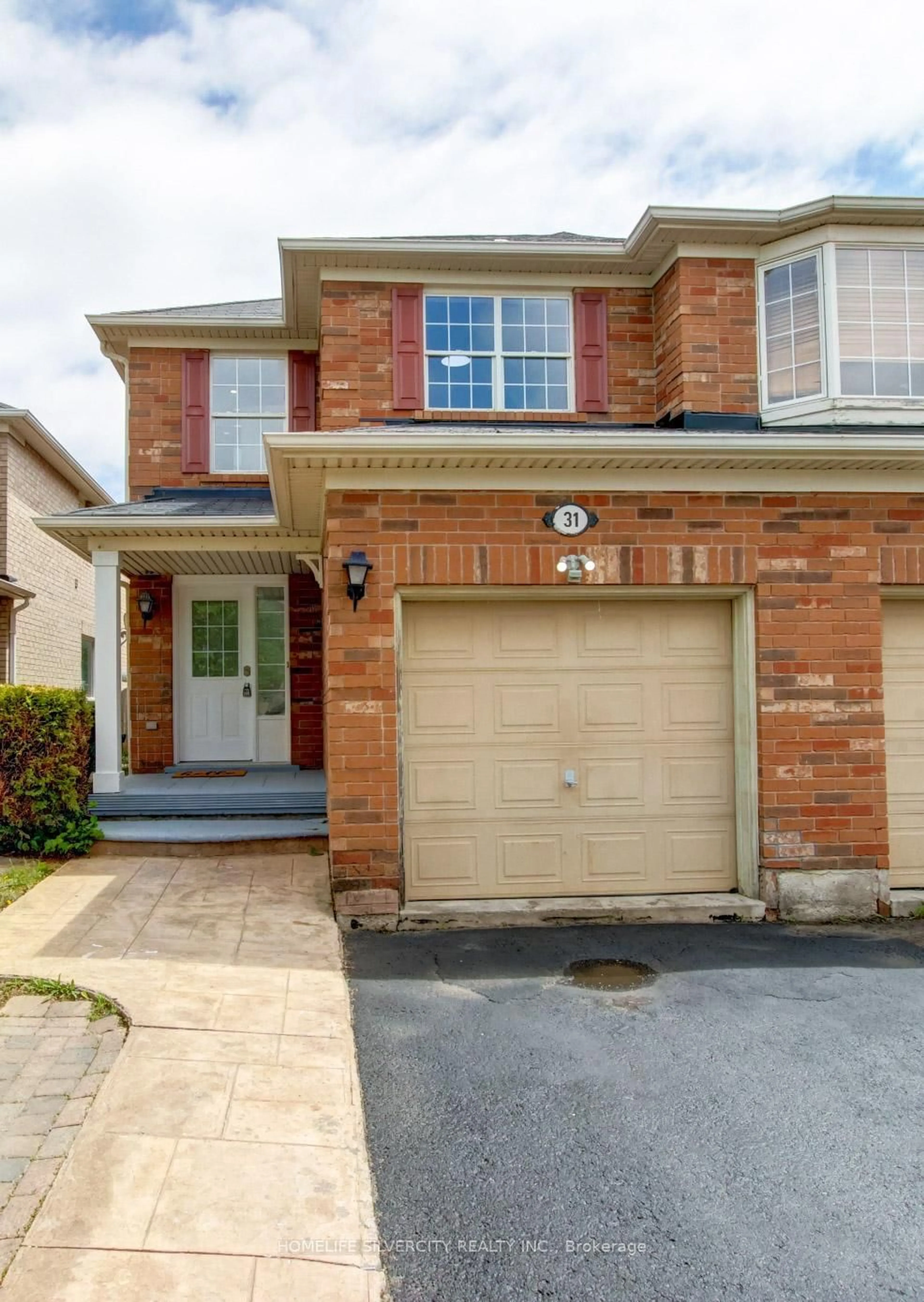 Home with brick exterior material, street for 31 Garibaldi Dr, Brampton Ontario L6X 4Z2