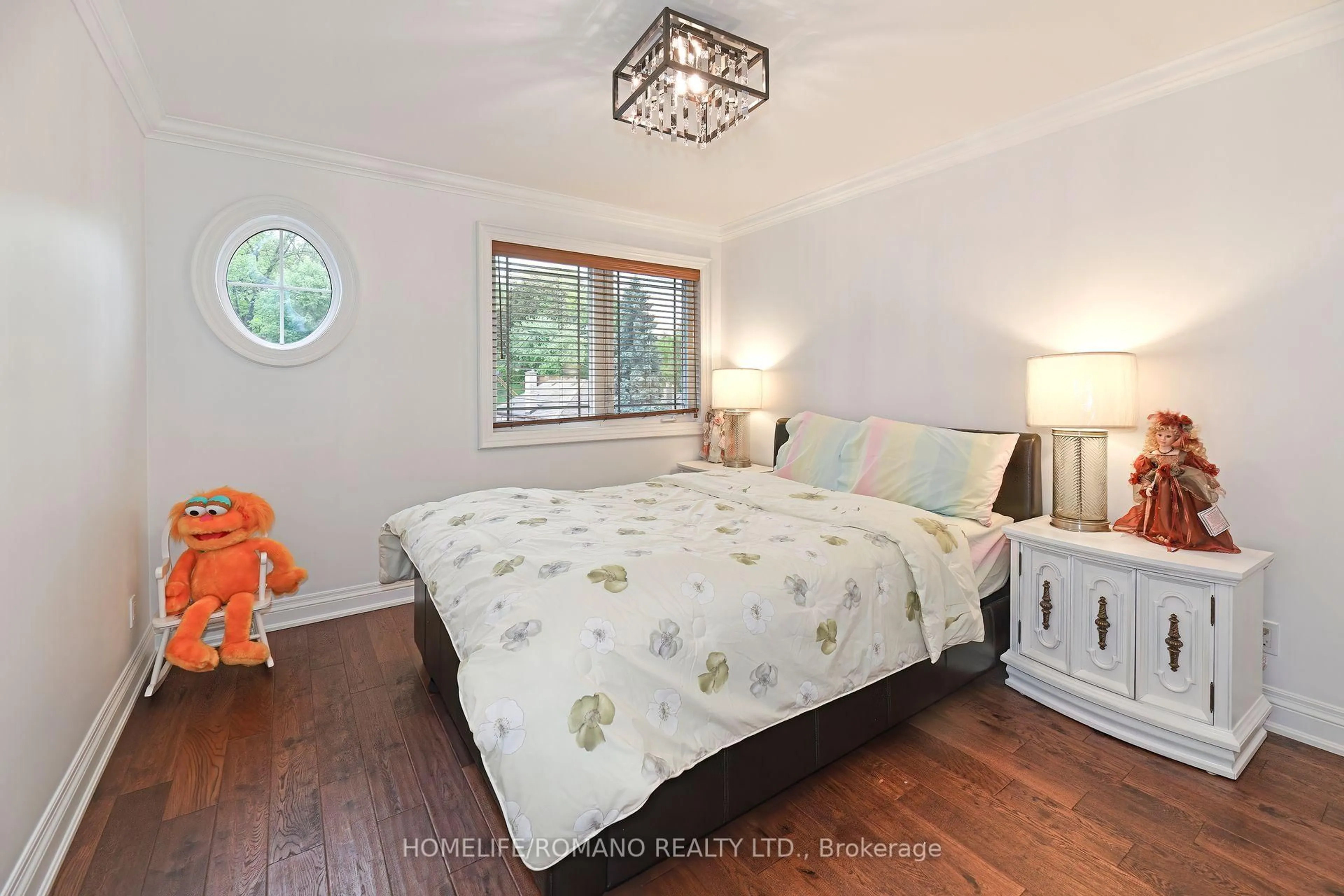 Bedroom with bed, wood/laminate floor for 566 Mcroberts Ave, Toronto Ontario M6E 4R6