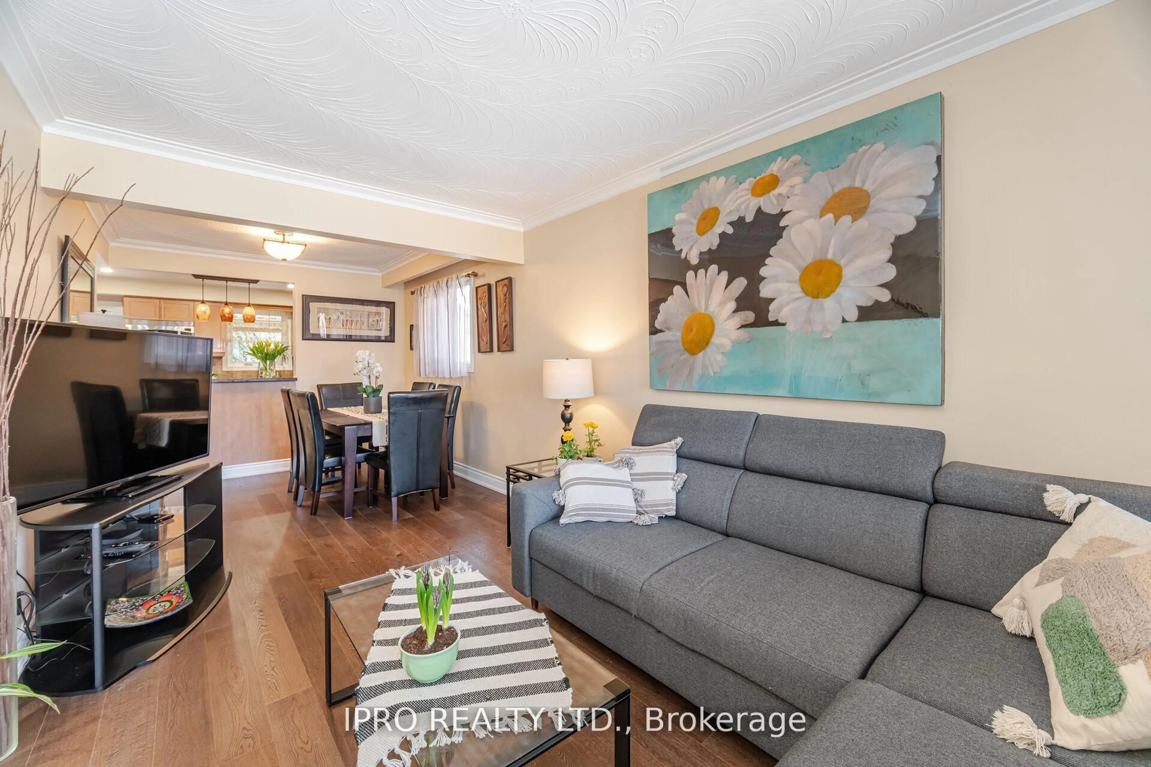 Living room with furniture, wood/laminate floor for 469 St Johns Rd, Toronto Ontario M6S 2L4