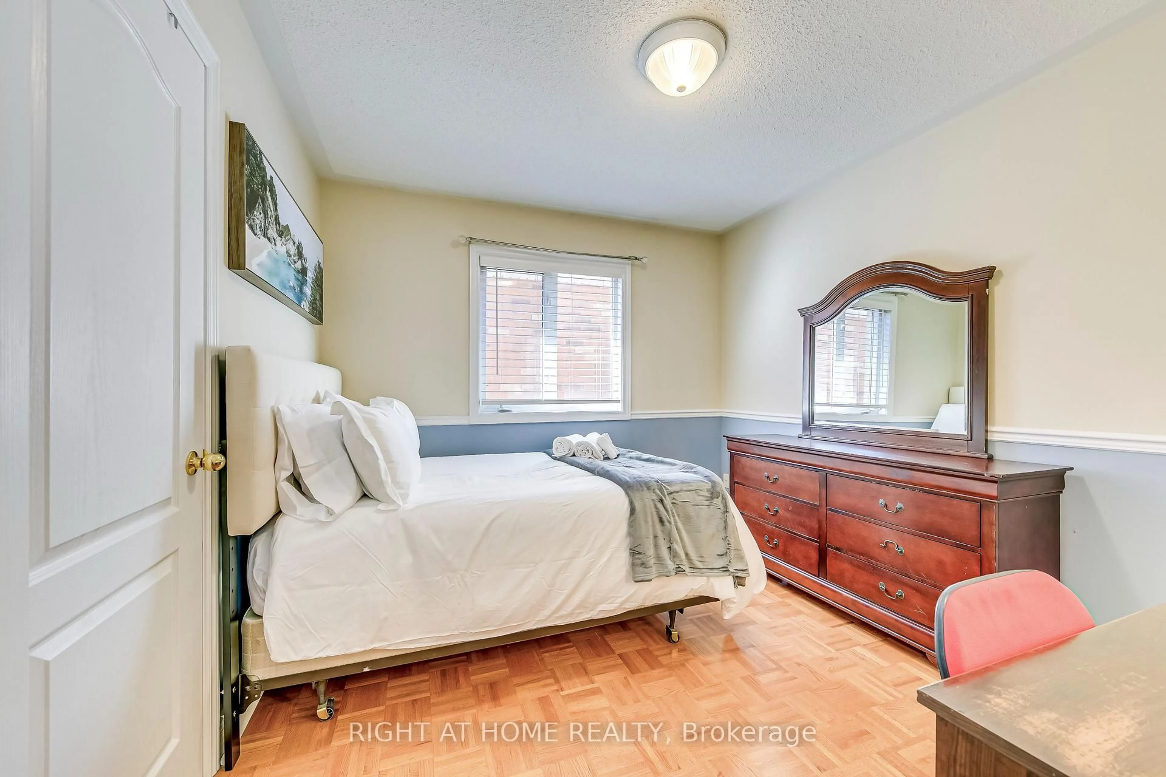 Bedroom with bed, wood/laminate floor for 814 Brass Winds Pl, Mississauga Ontario L5W 1T4