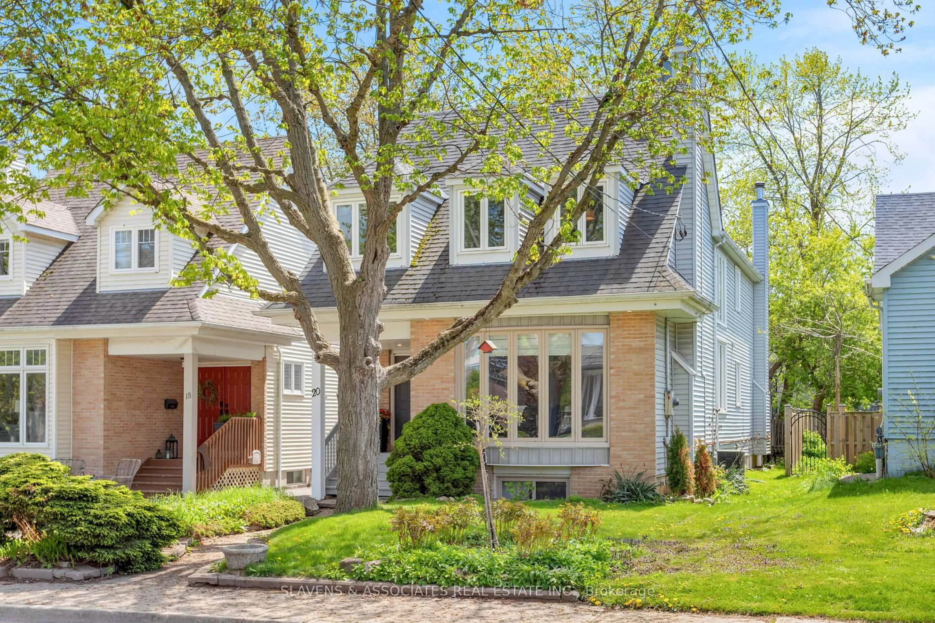 Home with brick exterior material, street for 20 Benson Ave, Mississauga Ontario L5H 2P4