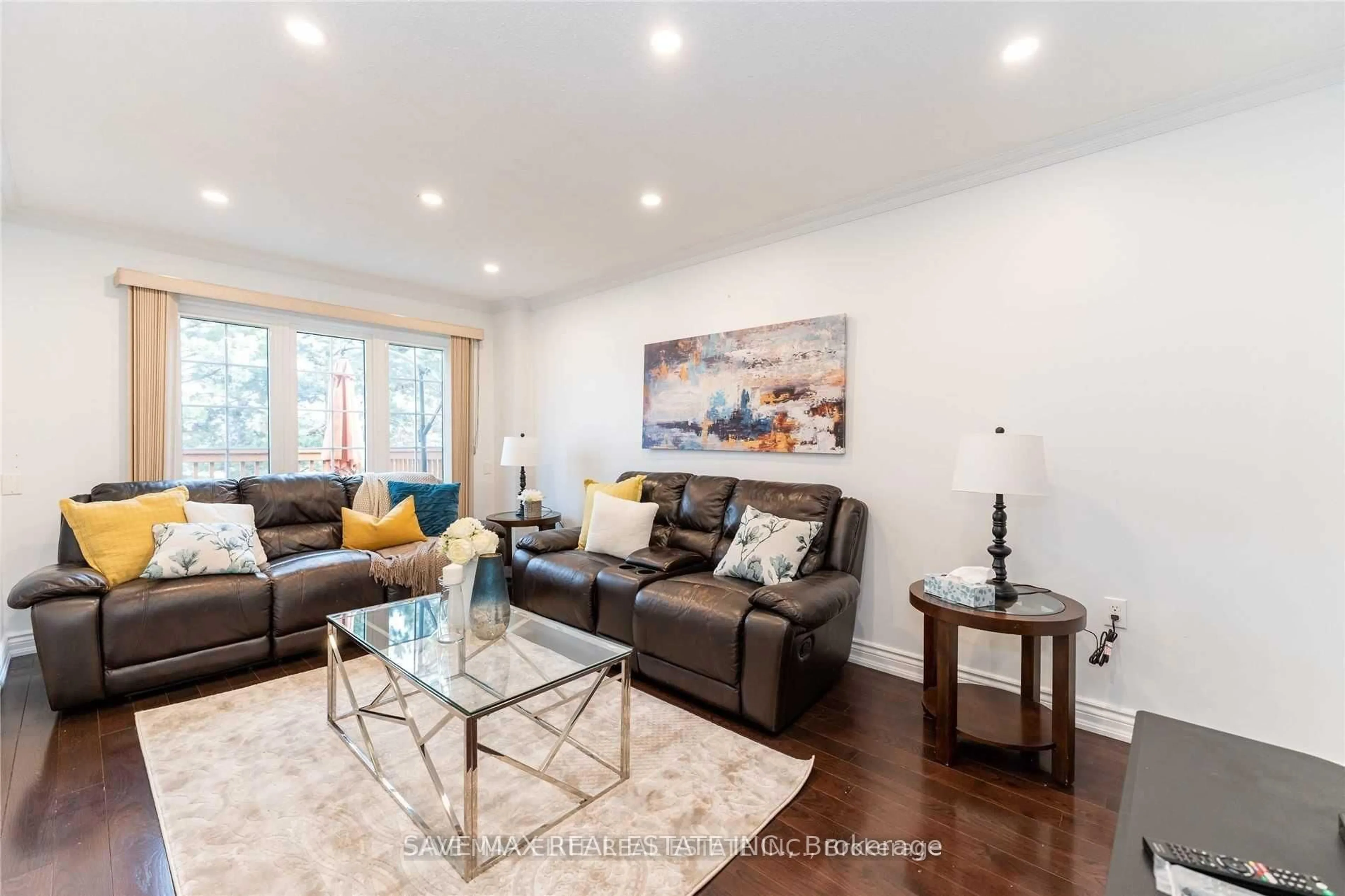 Living room with furniture, wood/laminate floor for 20 Bent Tree Crt, Brampton Ontario L6Y 4H6