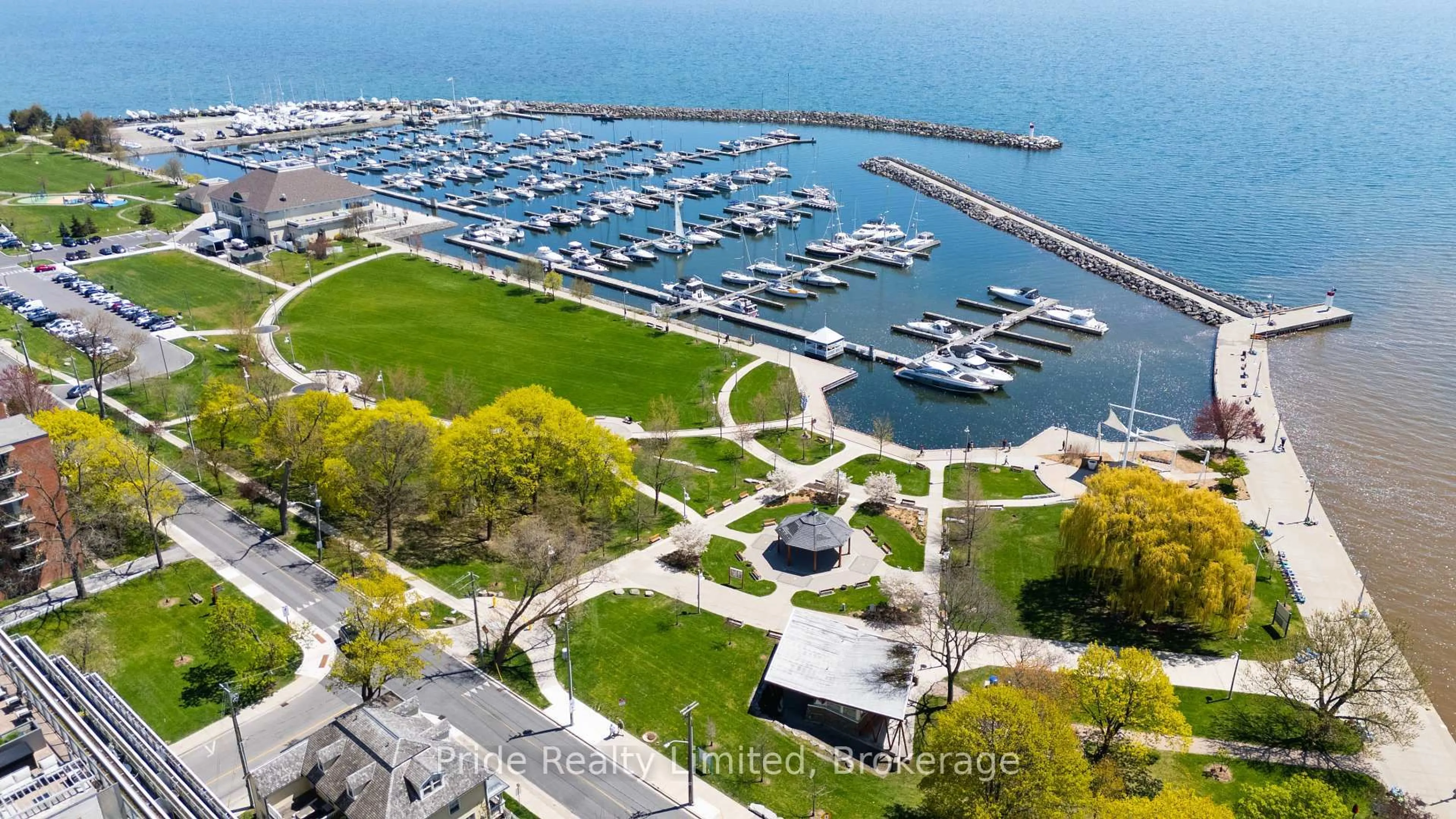 A pic from outside/outdoor area/front of a property/back of a property/a pic from drone, water/lake/river/ocean view for 11 Bronte Rd #210, Oakville Ontario L6L 0E1