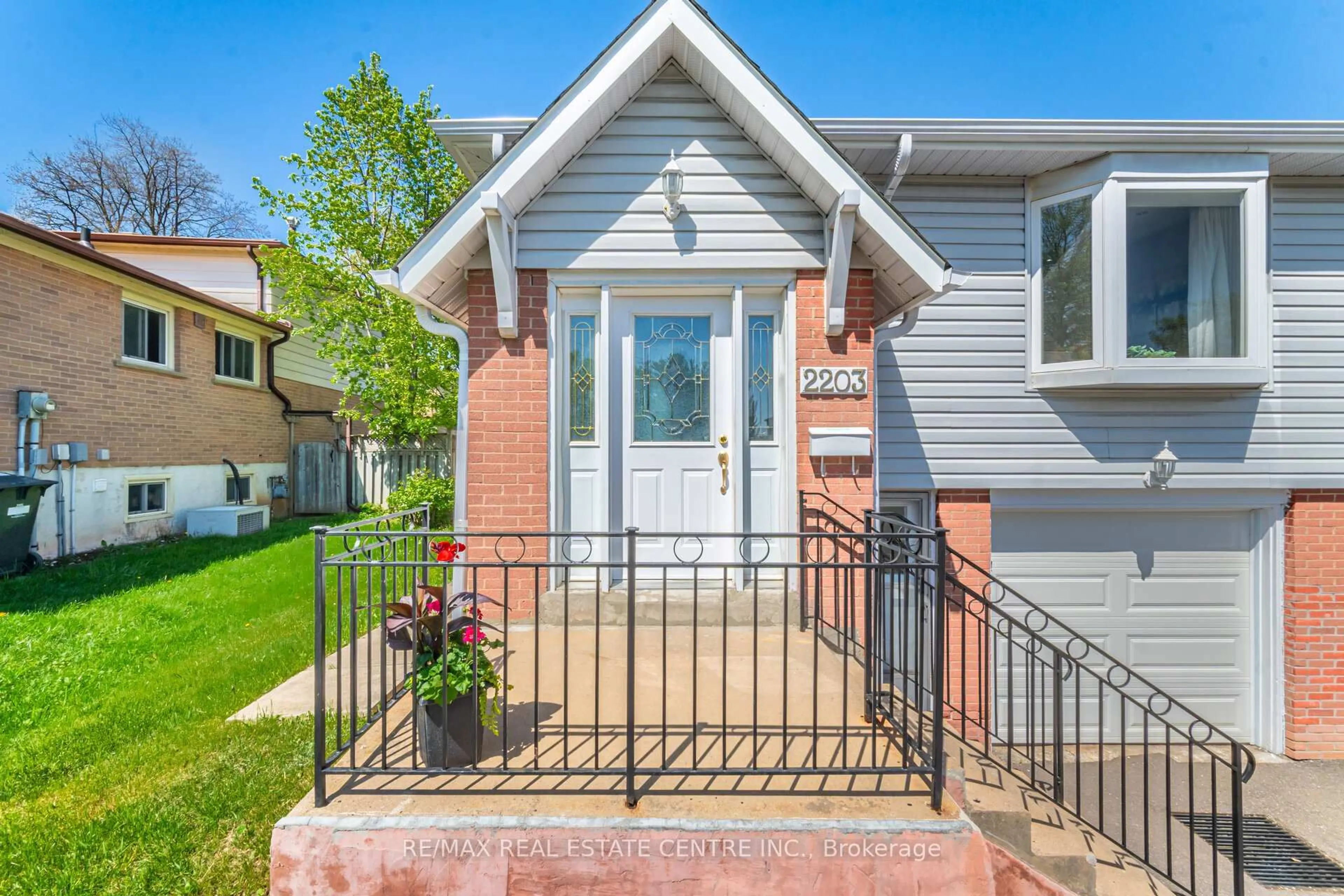 Home with brick exterior material, street for 2203 Council Ring Rd, Mississauga Ontario L5L 1B6