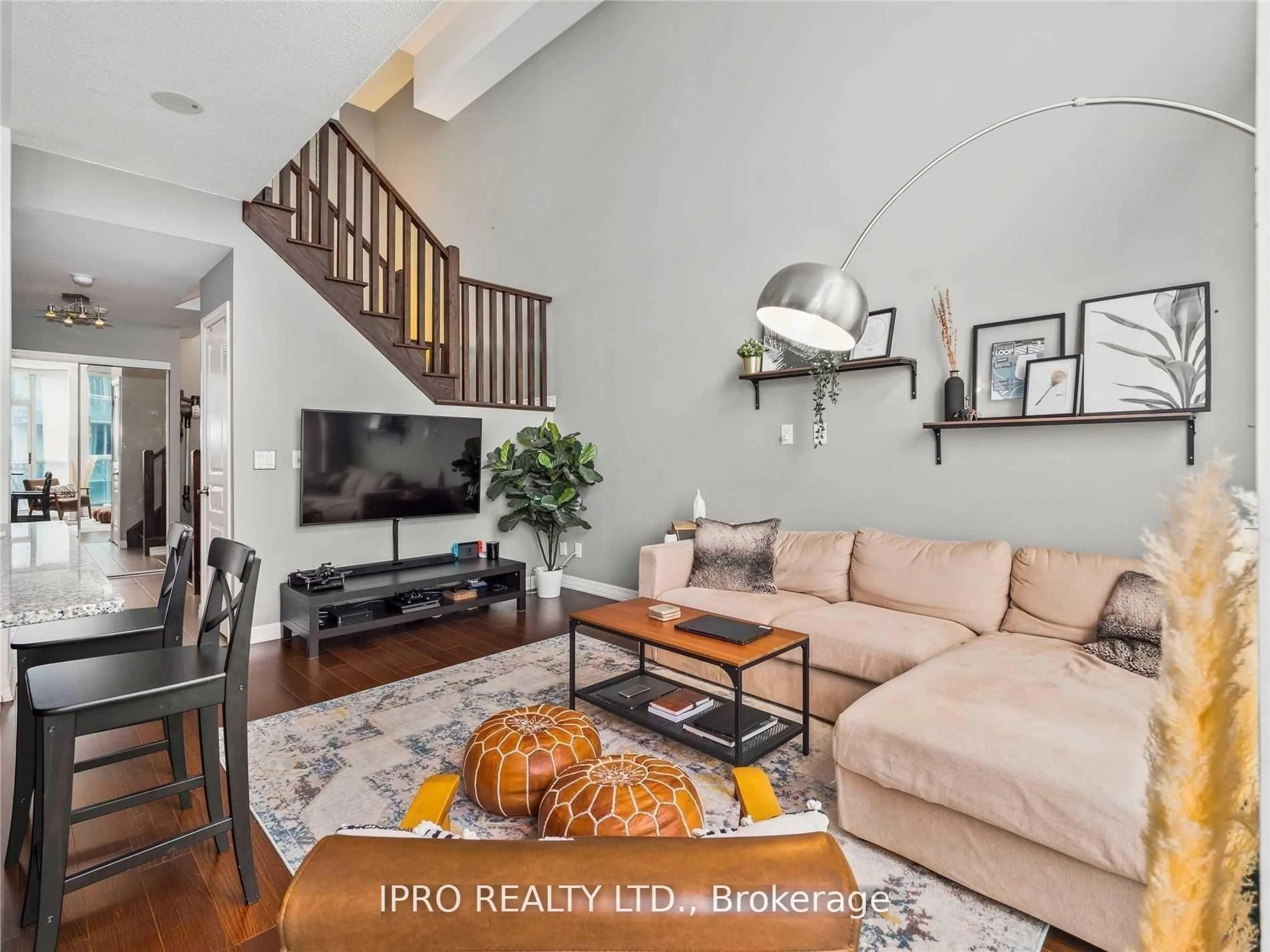 Living room with furniture, wood/laminate floor for 223 Webb Dr #3101, Mississauga Ontario L5B 0E8