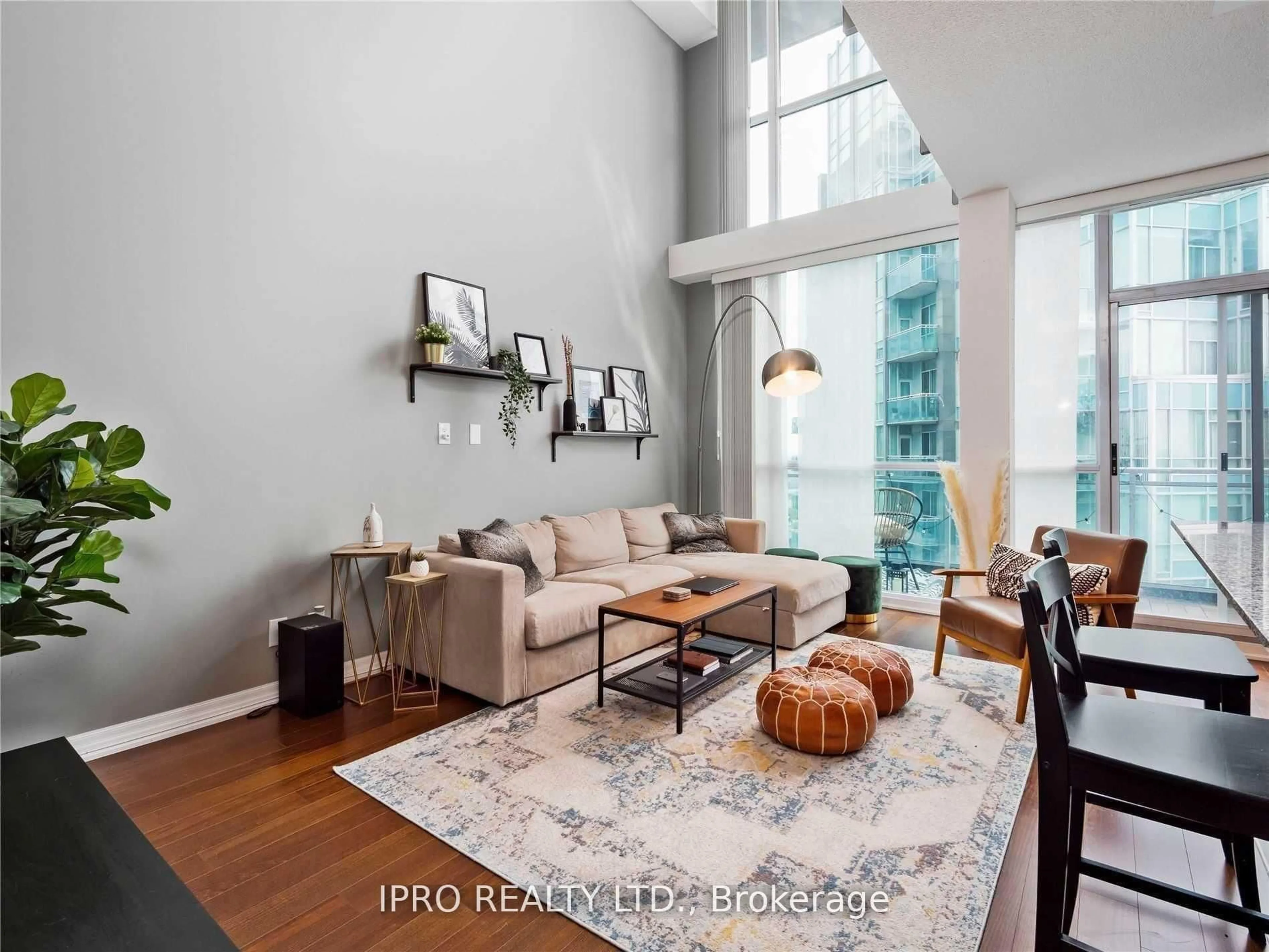 Living room with furniture, wood/laminate floor for 223 Webb Dr #3101, Mississauga Ontario L5B 0E8