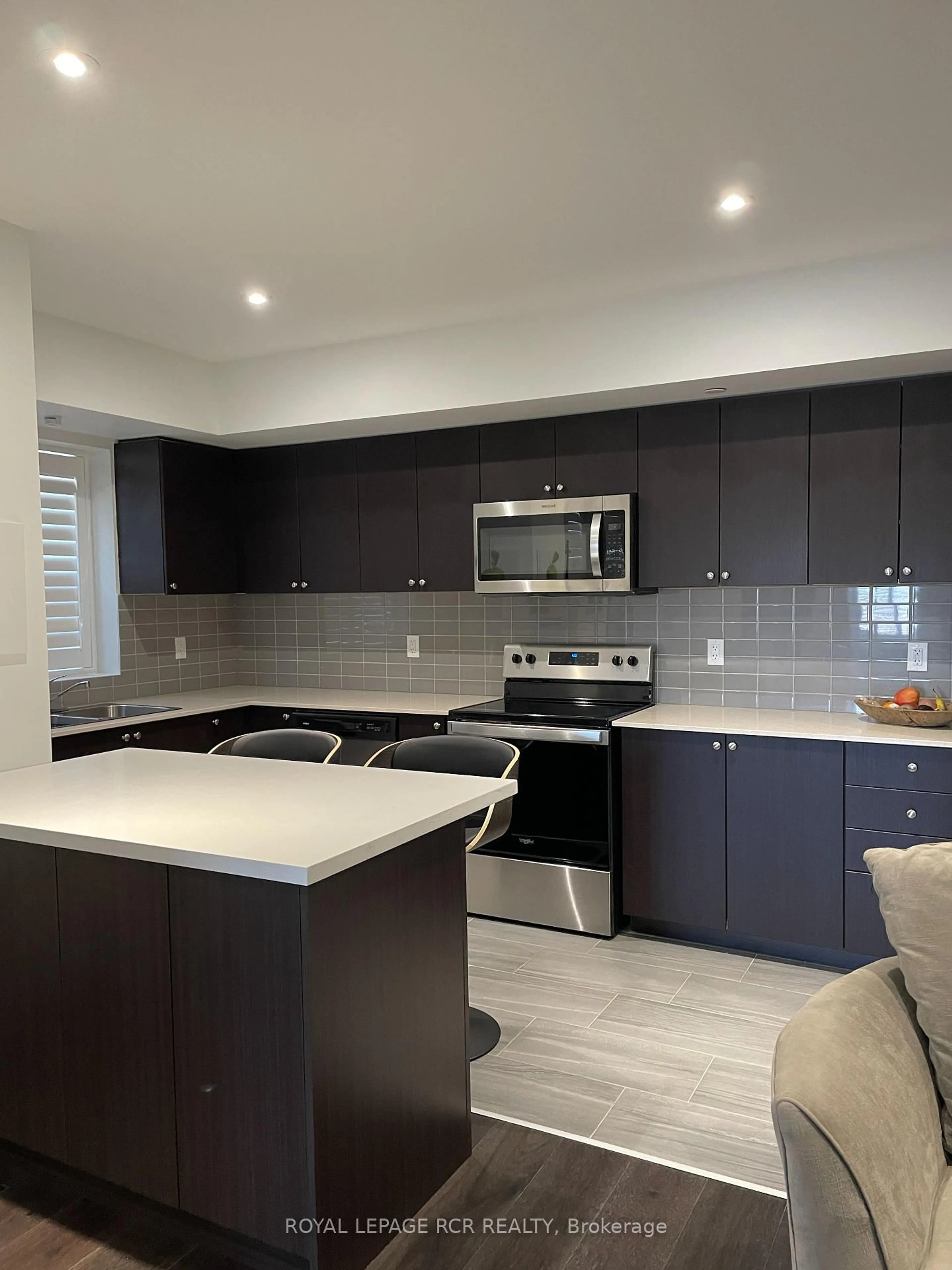 Open concept kitchen, ceramic/tile floor for 310 Broadway N/A #312, Orangeville Ontario L9W 1L3