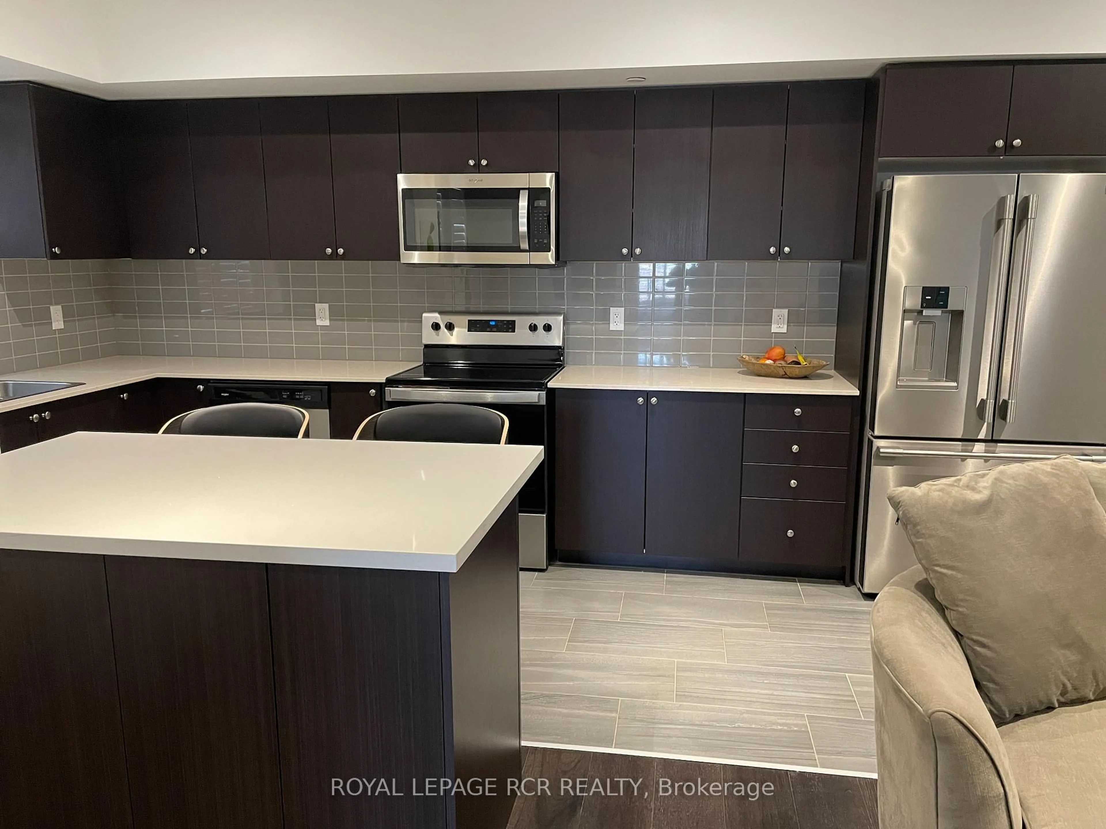 Open concept kitchen, ceramic/tile floor for 310 Broadway N/A #312, Orangeville Ontario L9W 1L3