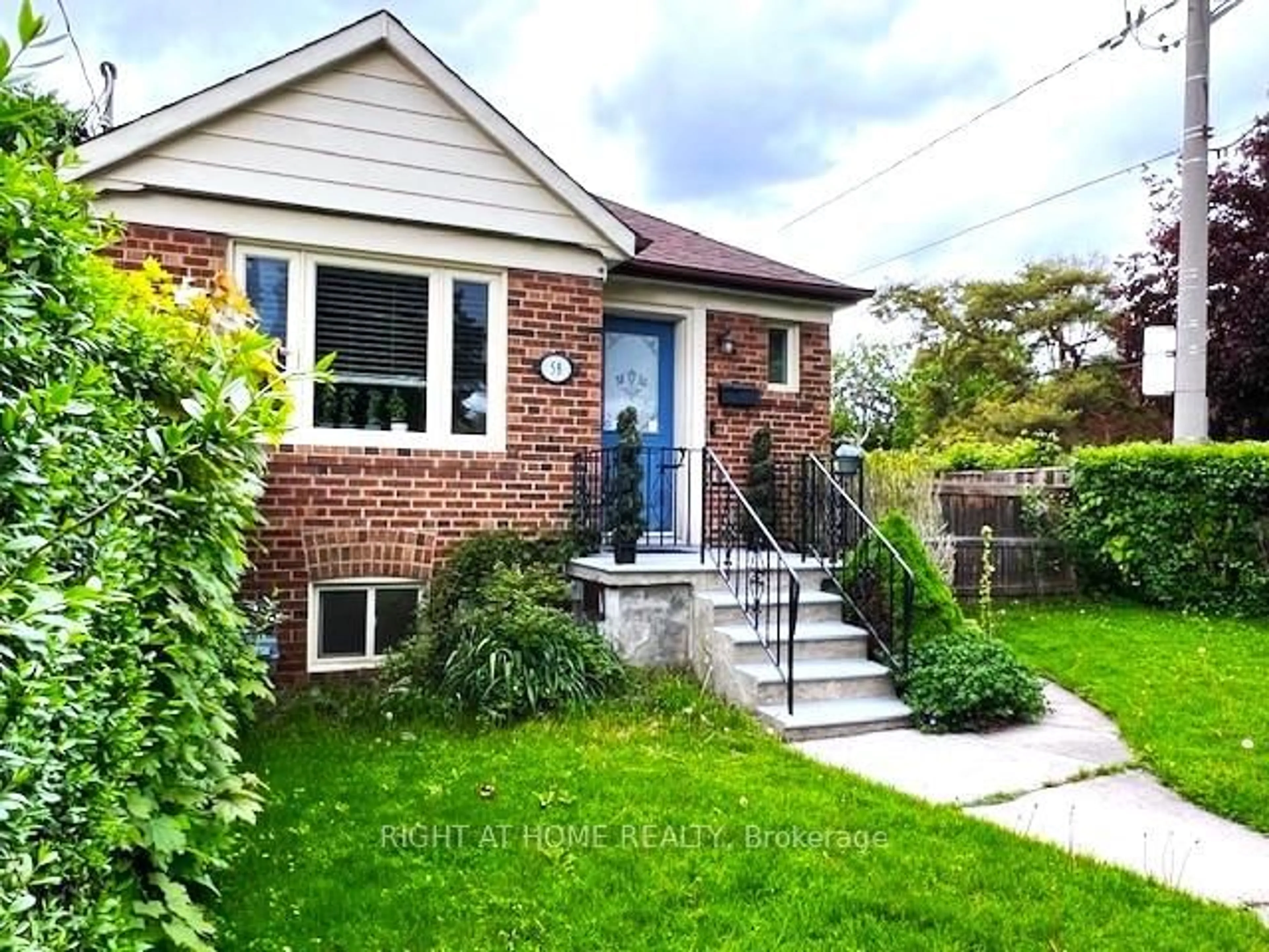 Home with brick exterior material, street for 58 Yore Rd, Toronto Ontario M6M 1W7