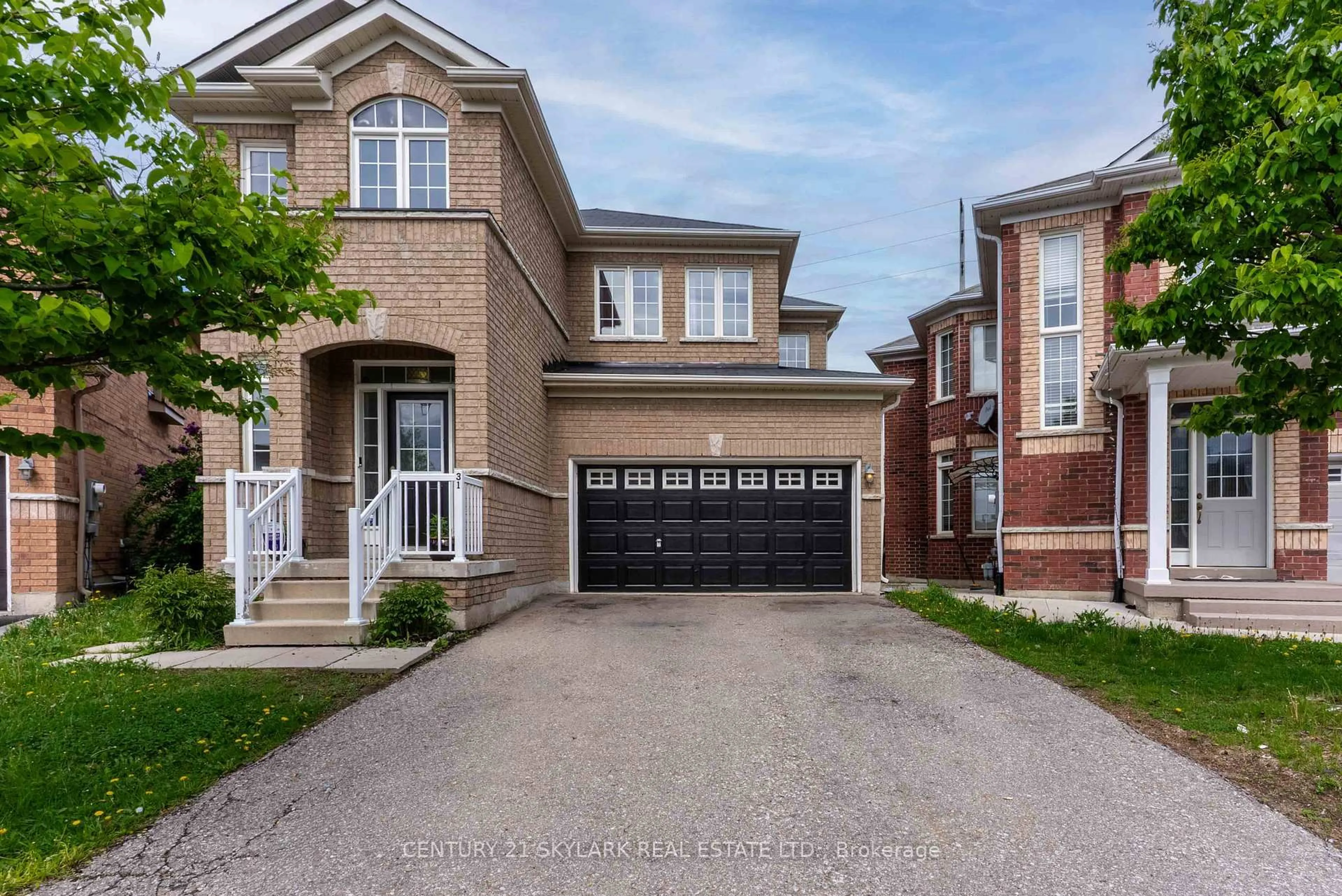 Home with brick exterior material, street for 31 Joywill Crt, Brampton Ontario L7A 3T9