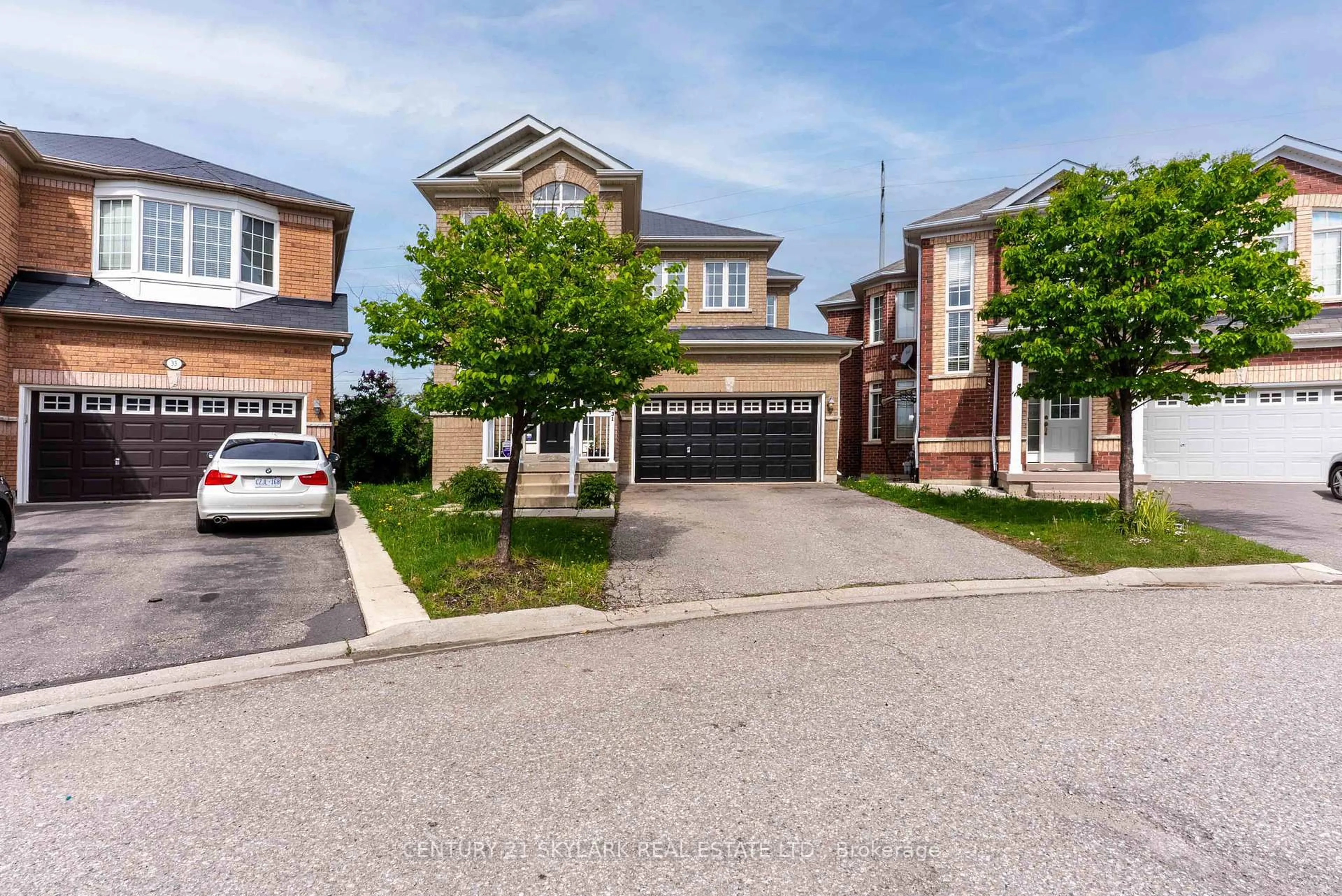Home with brick exterior material, street for 31 Joywill Crt, Brampton Ontario L7A 3T9